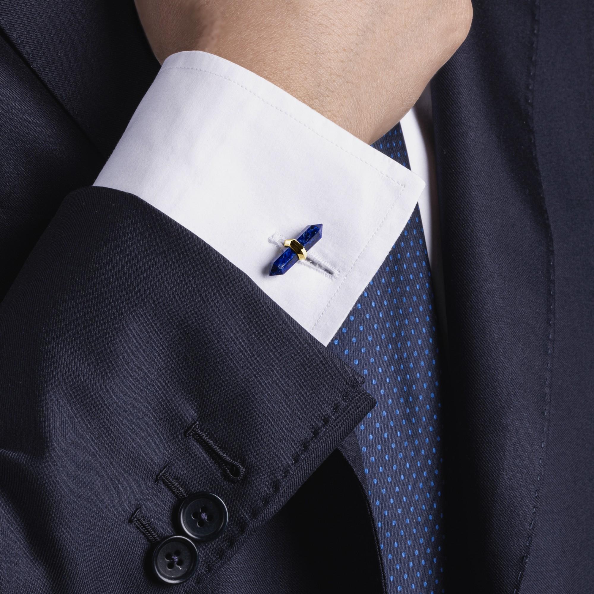 Alex Jona design collection, hand crafted in Italy, 18 karat yellow gold cufflinks with two Lapis Lazuli and two chalcedony prism bars weighing 20.9 carats in total. Dimensions: 22 in. L x 0.19 in. W 9 mm. L x 5 mm.  

Alex Jona cufflinks stand out,