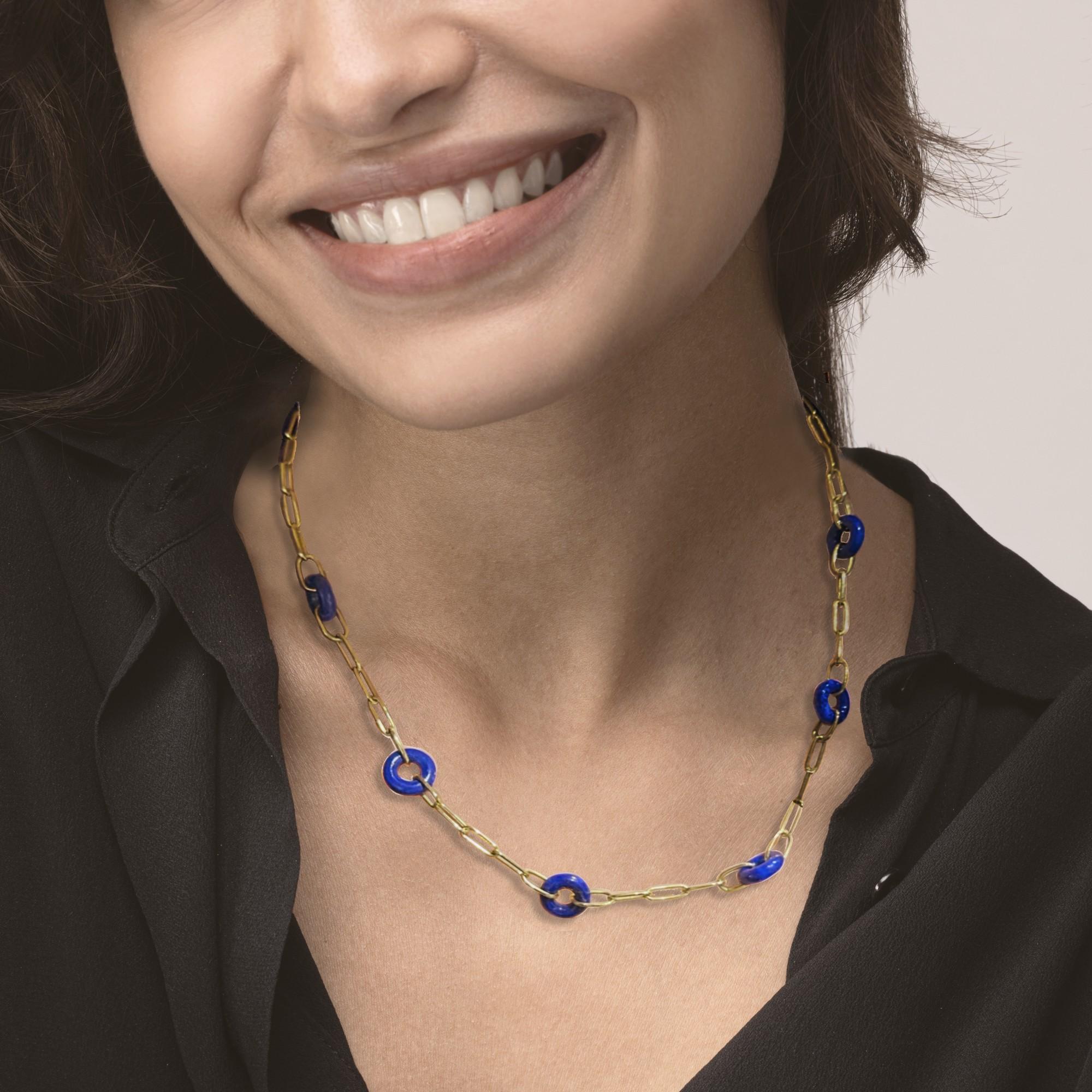 Alex Jona design collection, hand crafted in Italy, 18 karat yellow gold chain necklace featuring 6 lapis lazuli hoops. 
Alex Jona jewels stand out, not only for their special design and for the excellent quality of the gemstones, but also for the