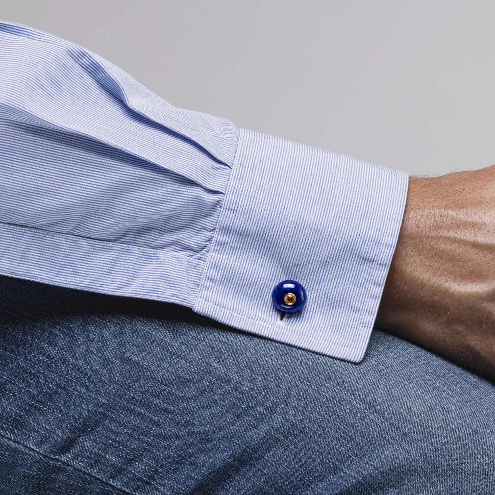 Alex Jona design collection, hand crafted in Italy, lapis lazuli button cufflinks centering two yellow sapphires, mounted in 18 karat yellow gold. 
Alex Jona cufflinks stand out, not only for their special design and for the excellent quality, but