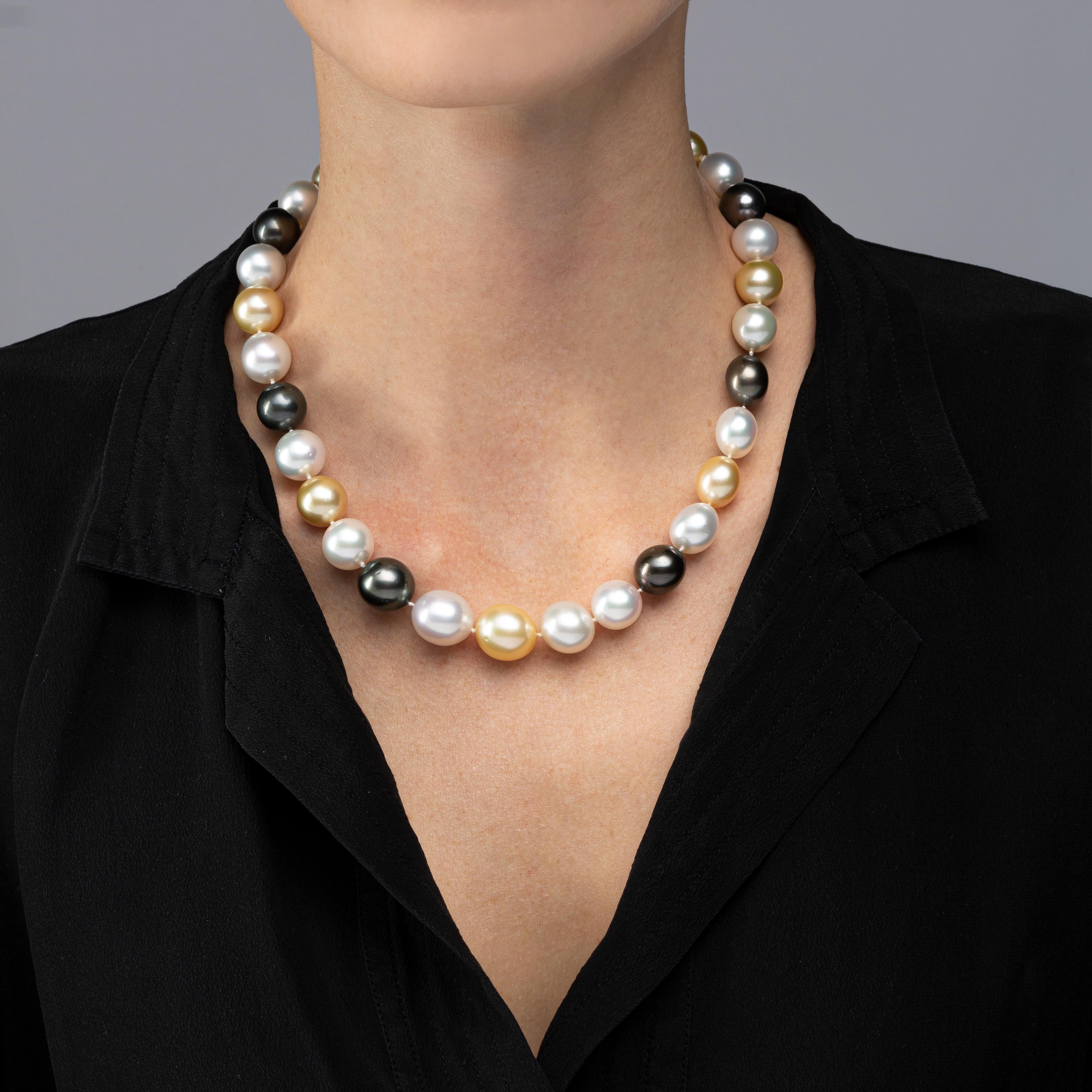 Alex Jona eighteen inch long necklace consisting of thirty three, 0.45 - 0.55 in. / 11.5-14.1mm, white, gold and black South Sea pearls, the pearls are strung with an invisible clasps. Pearl Quality: AA - Pearl Luster: AA
The Origin of the pearls