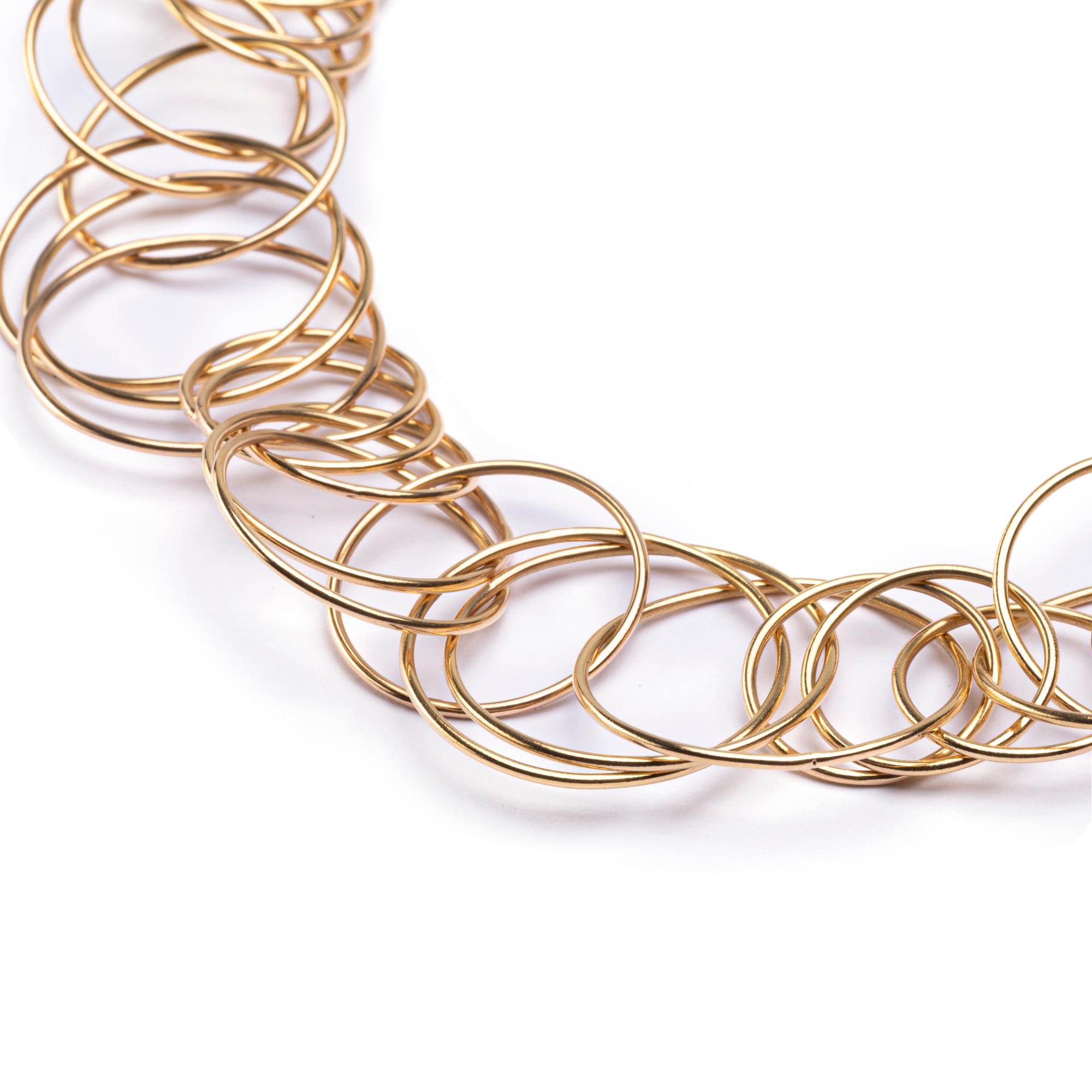 Alex Jona design collection, hand crafted in Italy, 18 Karat yellow gold, multi interlocking hoop chain necklace . Length 21.26 in / 54.6 cm.

Alex Jona jewels stand out, not only for their special design and for the excellent quality of the