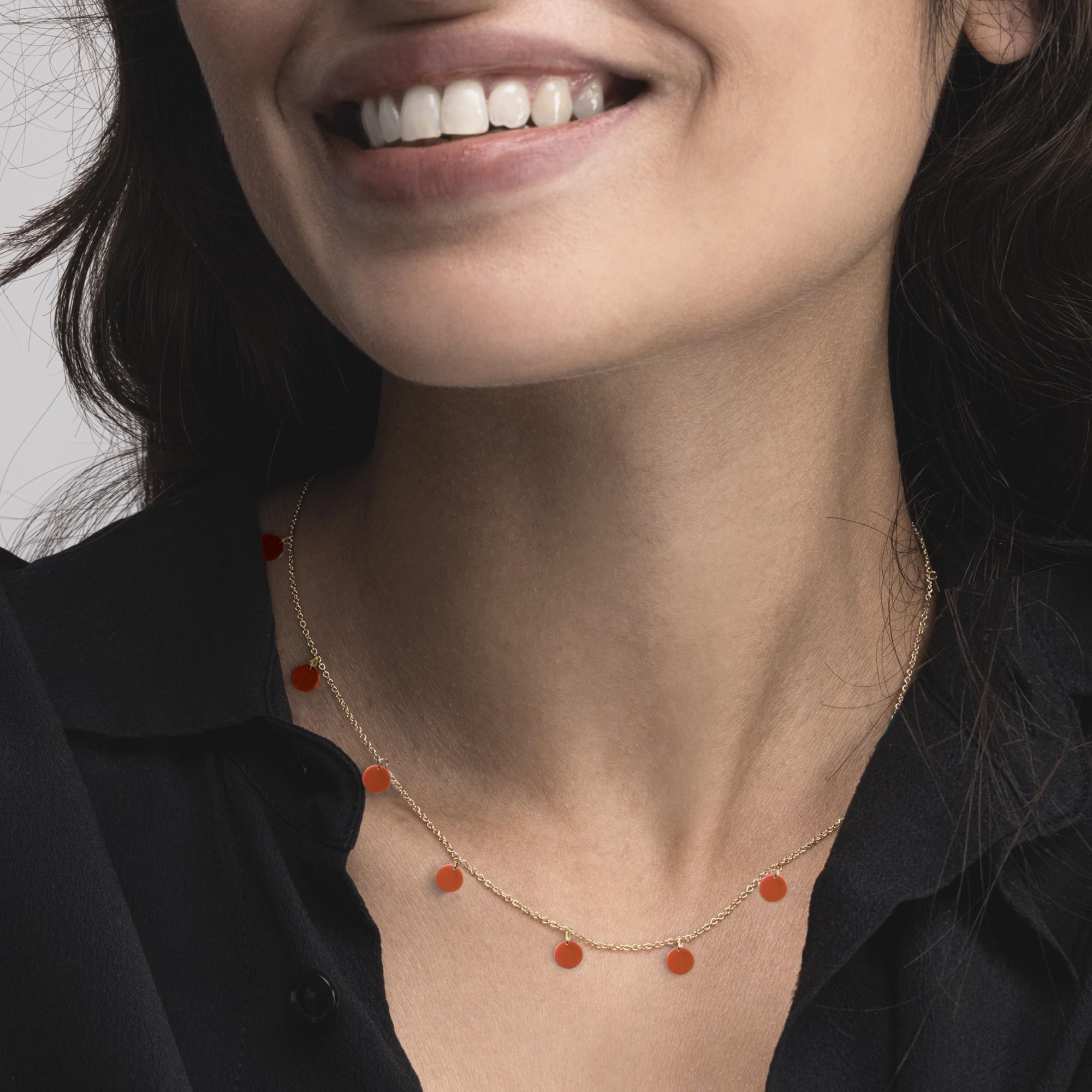 Alex Jona design collection, hand crafted in Italy, 18 karat yellow gold chain necklace suspending 11 Mediterranean coral pendant discs. 

Alex Jona jewels stand out, not only for their special design and for the excellent quality of the gemstones,