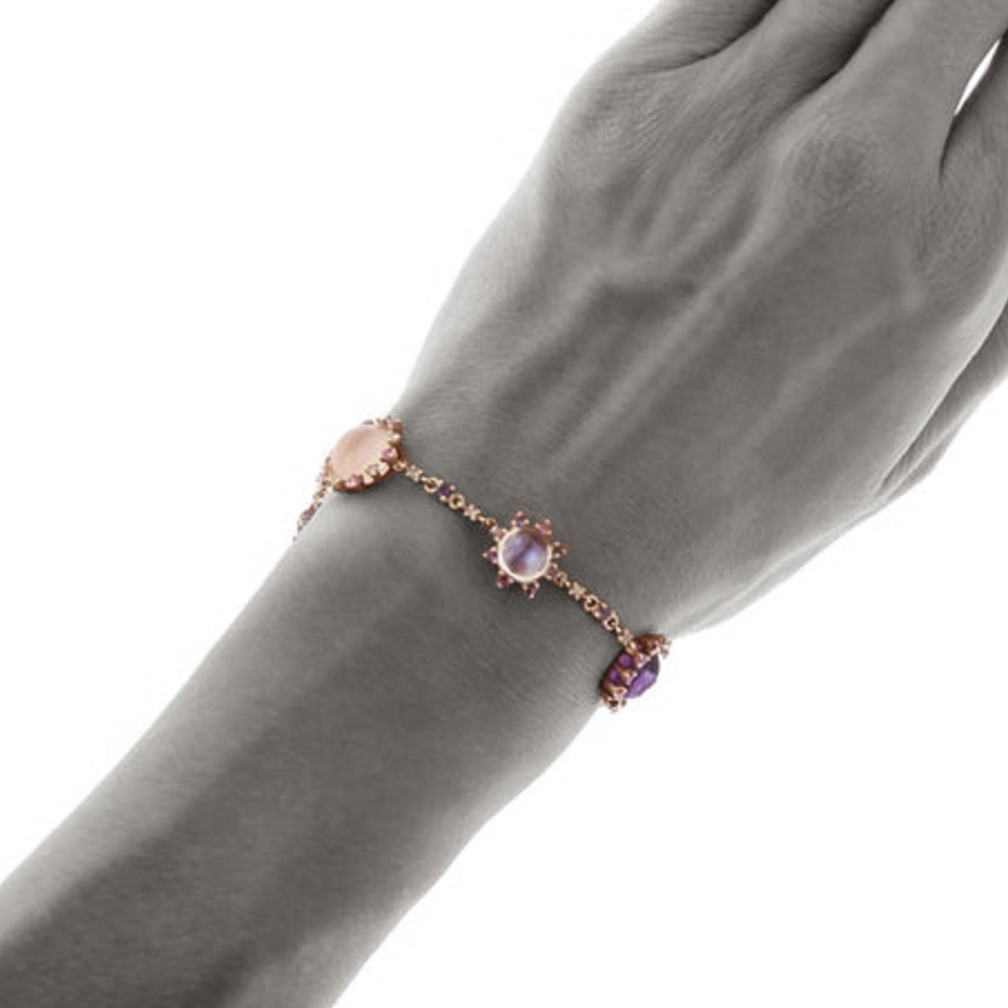 Alex Jona design collection, hand crafted in Italy, 18 karat rose gold link bracelet, consisting of six flower links set with pink sapphires and brown diamonds, centering two cabochon moonstones, two cabochon amethysts and two cabochon rose quartz.
