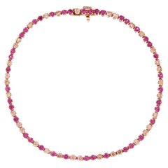 Alex Jona Bracciale tennis in oro rosa 18 carati con zaffiri rosa e diamanti marroni