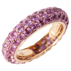 Anello a fascia per l
eternità in oro giallo 18 carati con zaffiro rosa pavé di Alex Jona