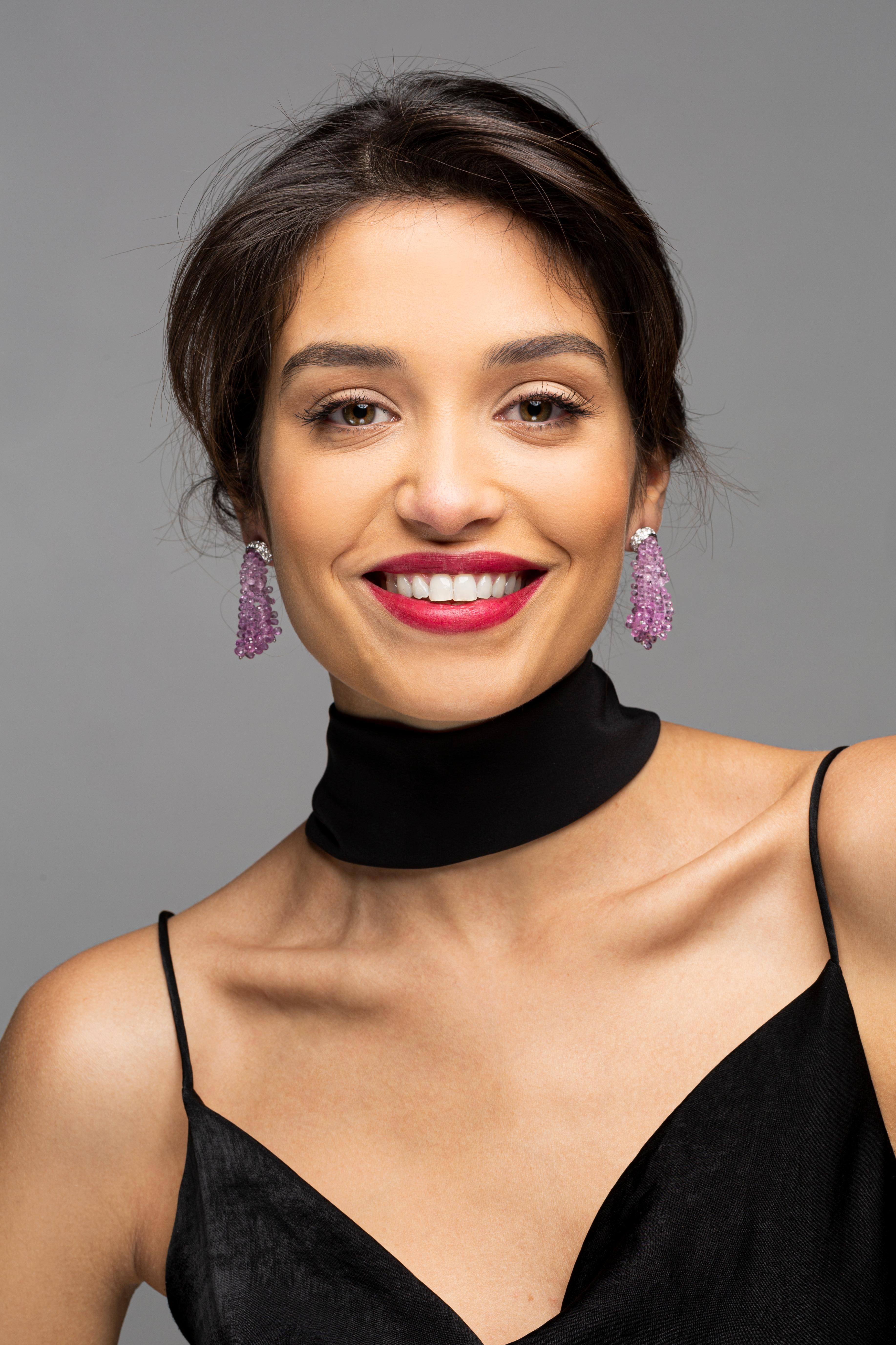 Alex Jona one-of-a-kind design, hand crafted in Italy, pair of chandelier earrings featuring clusters of briolette cut graduated pink sapphires for a total weight of 61.85 carats, sustained by a fine 18 karat white gold mounting set with 1.52 carats