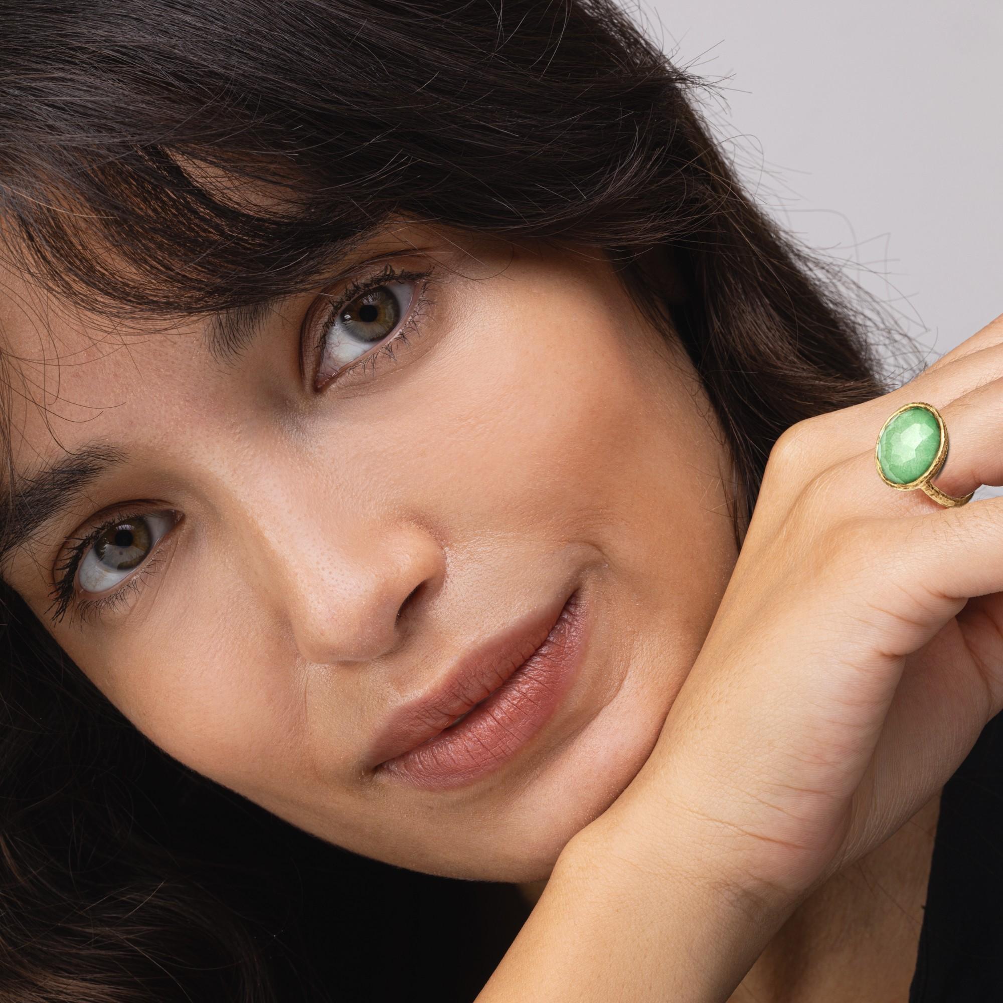 Alex Jona design collection, hand crafted in Italy, 18 Karat yellow gold ring set with a crazy cut quartz over green jade, weighing 8.76 carats.
Size US 6 , can be sized to any specification

Alex Jona jewels stand out, not only for their special