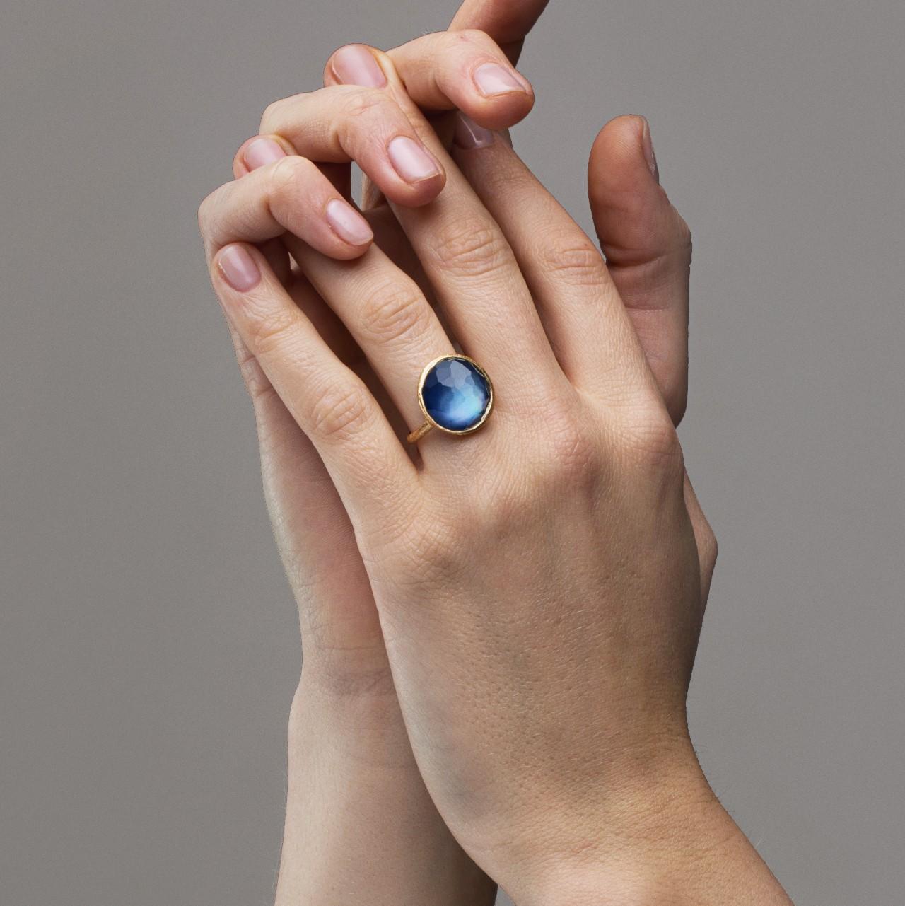 Alex Jona design collection, hand crafted in Italy, 18 Karat yellow gold ring set with a crazy cut Quartz over Lapis Lazuli, weighing 7.18 carats.
Size US 6 , can be sized to any specification

Alex Jona jewels stand out, not only for their special