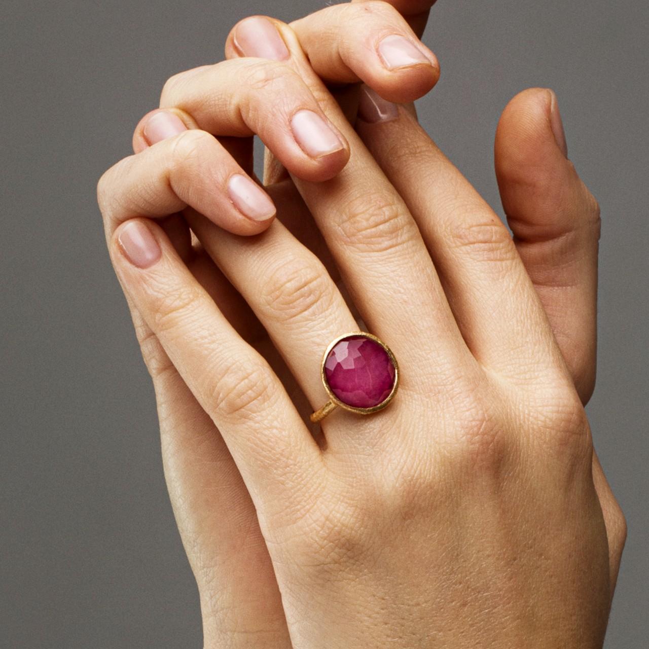 Alex Jona design collection, hand crafted in Italy, 18 karat yellow gold ring set with a crazy cut quartz over Ruby, weighing 7.18 carats. Size US 6, can be sized to any specification
Alex Jona jewels stand out, not only for their special design and