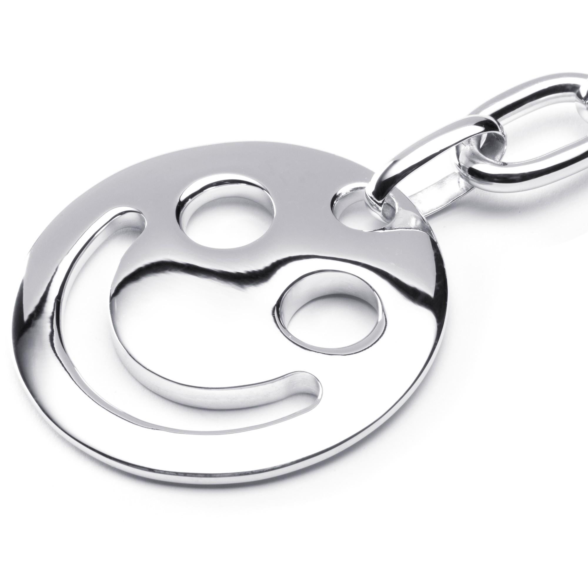 Alex Jona design collection, hand crafted in Italy, rhodium plated Smile Sterling Silver key holder. Dimensions: Diameter: 1.39 in/3.53 mm

Alex Jona gifts stand out, not only for their special design and for the excellent quality, but also for the