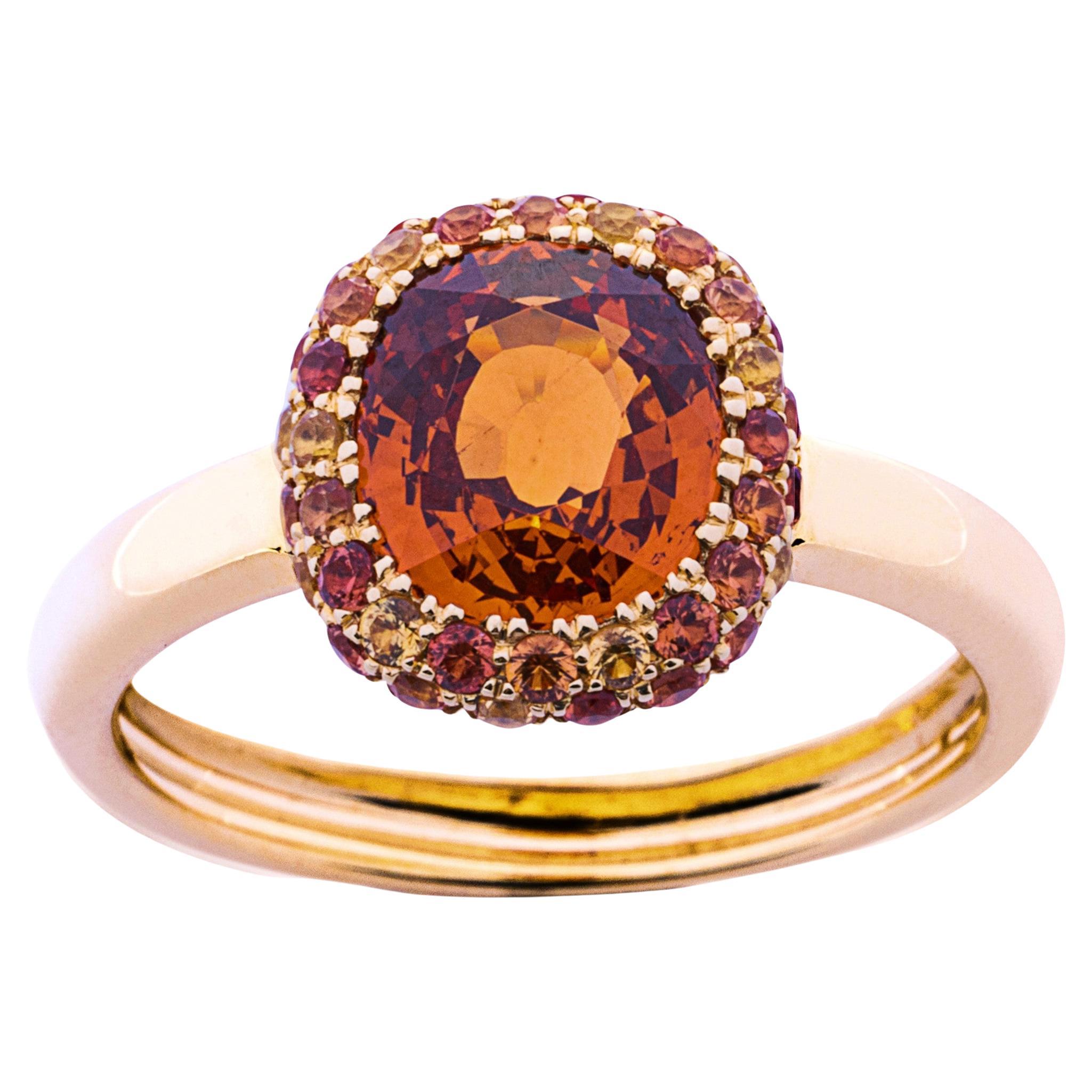 Alex Jona, bague jonc en or jaune 18 carats avec grenat spessartite et saphir orange