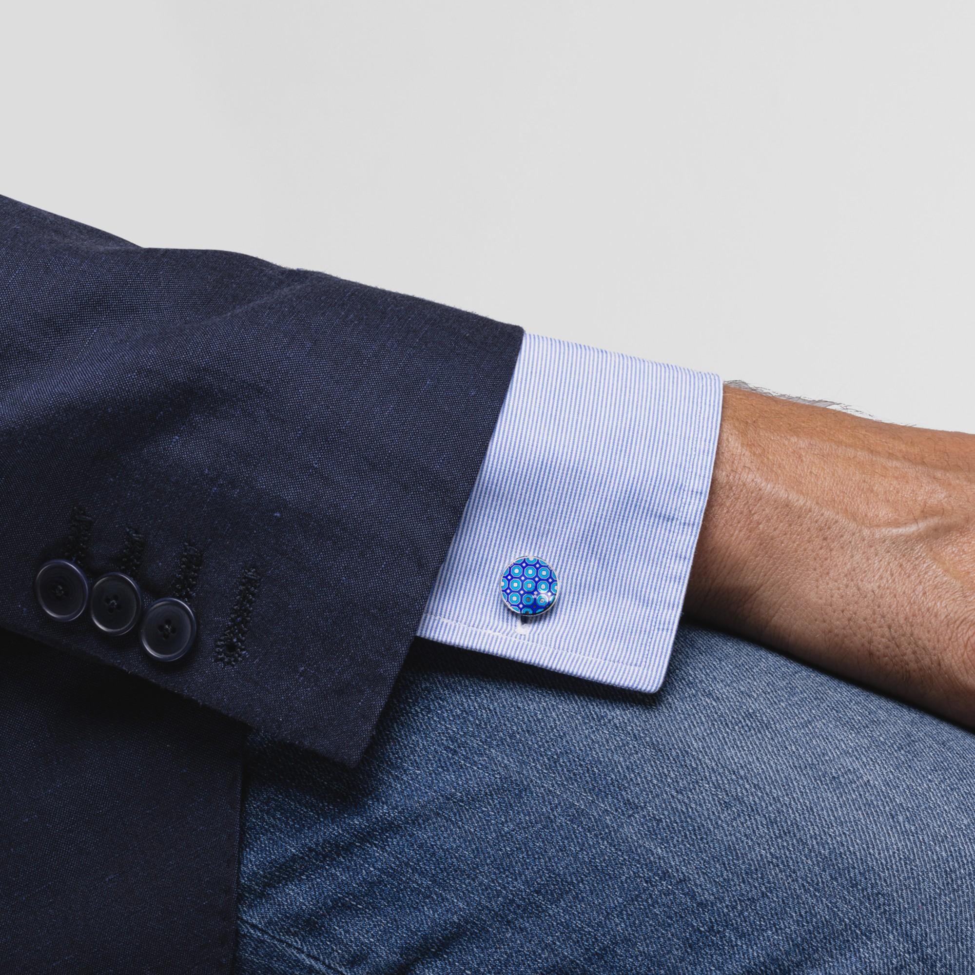 Alex Jona design collection, hand crafted in Italy, rhodium plated Sterling Silver cufflinks with blue enamel. These cufflinks feature a T-Bar fastening, aiding in easy use and confidence that they'll stay secured to your shirt. Dimensions: 