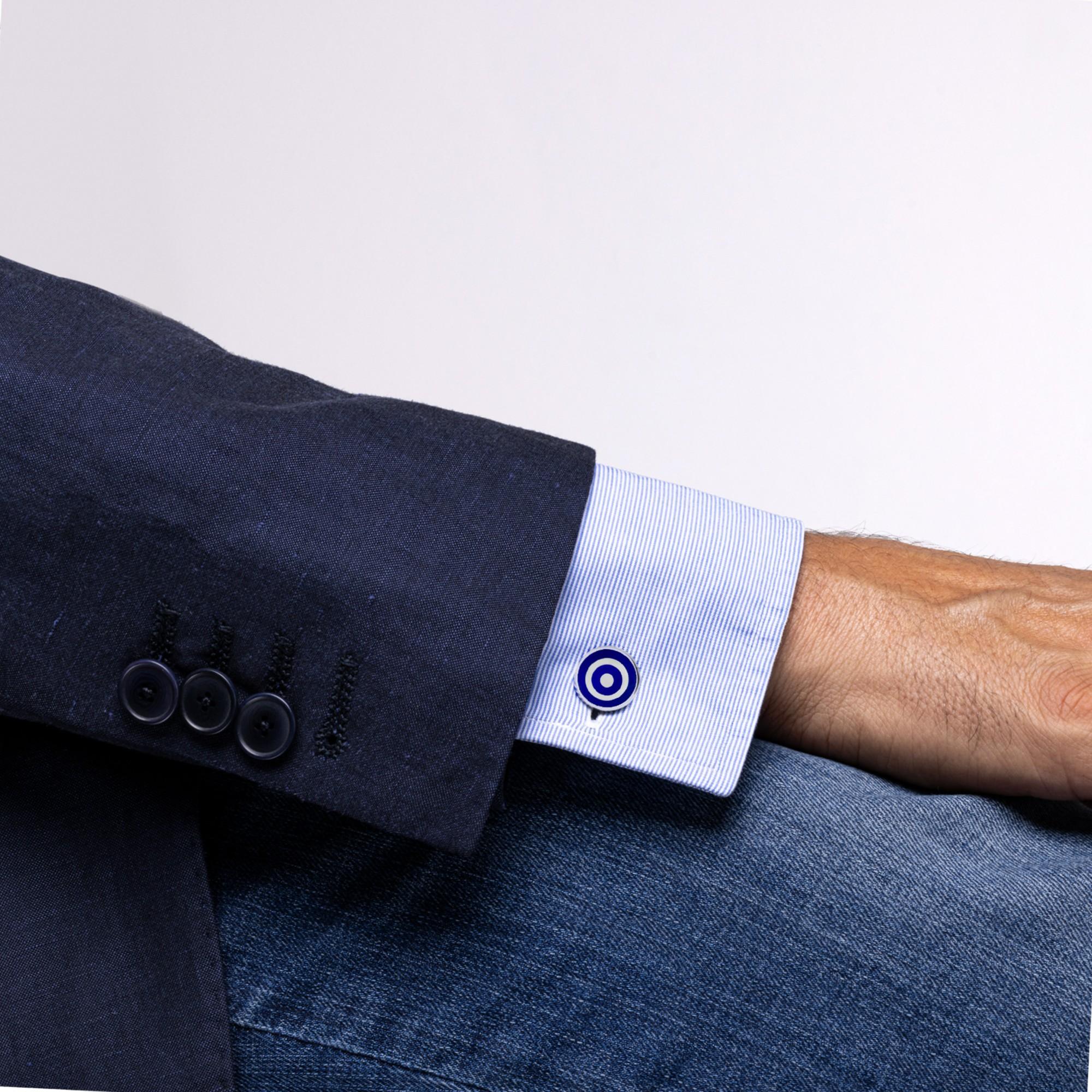 Alex Jona design collection, hand crafted in Italy, rhodium plated Sterling Silver cufflinks with blue enamel. These cufflinks feature a T-Bar fastening, aiding in easy use and confidence that they'll stay secured to your shirt. Diameter: 0.63 in /
