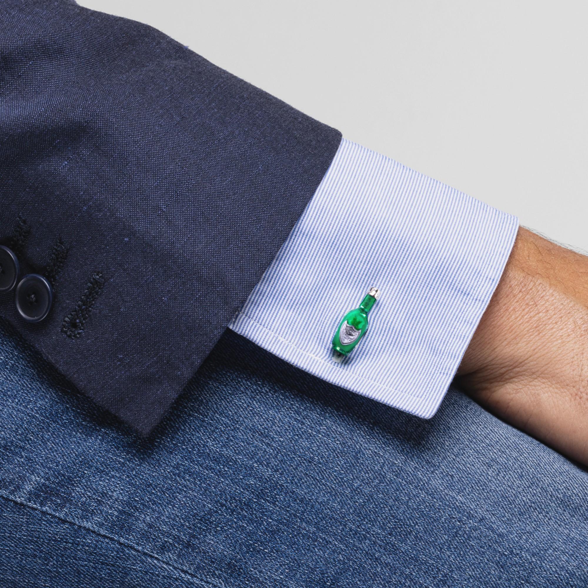 Celebrate with Alex Jona champagne bottle & cork cufflinks!
These sophisticated green champagne bottle cufflinks are perfect for special occasions. They have been designed by Alex Jona, hand crafted in Italy in sterling silver with green enamel for