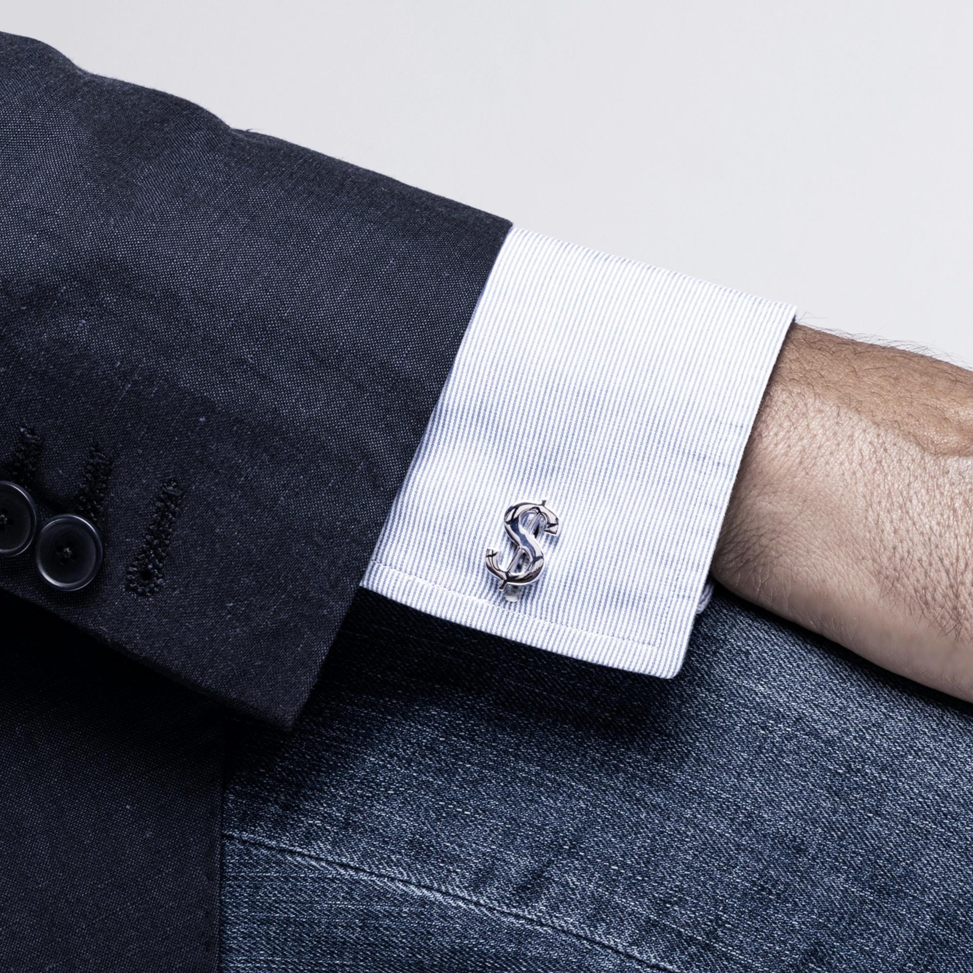 Collezione di design Alex Jona, realizzata a mano in Italia, gemelli da polso in argento sterling placcato rodio Dollar $. Questi gemelli sono dotati di una chiusura a T-Bar, che ne facilita l'uso e garantisce il fissaggio alla camicia. Dimensioni: 