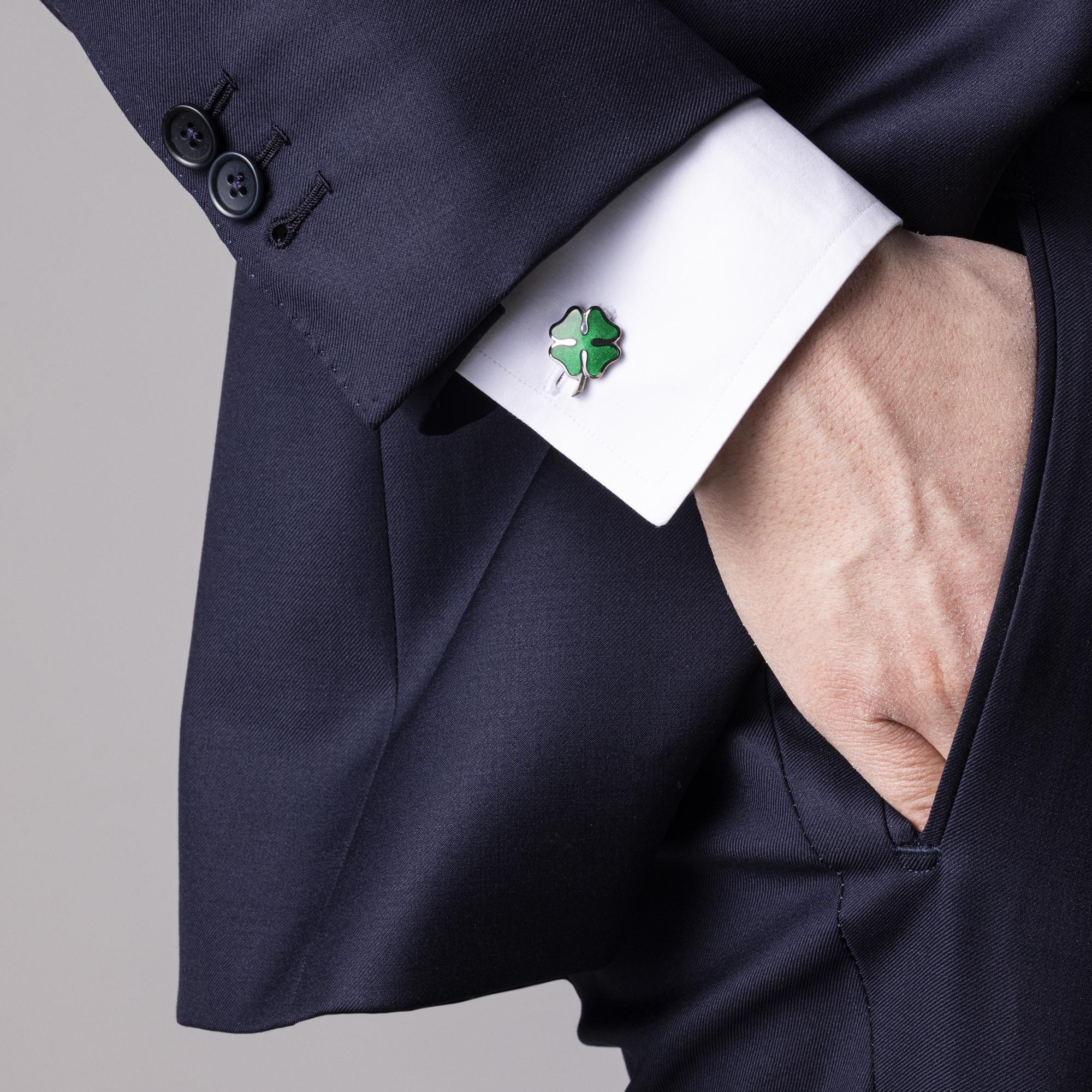 Alex Jona design collection, hand crafted in Italy, rhodium plated Sterling Silver lucky clover cufflinks with green enamel. These cufflinks feature a T-Bar fastening, aiding in easy use and confidence that they'll stay secured to your shirt.
