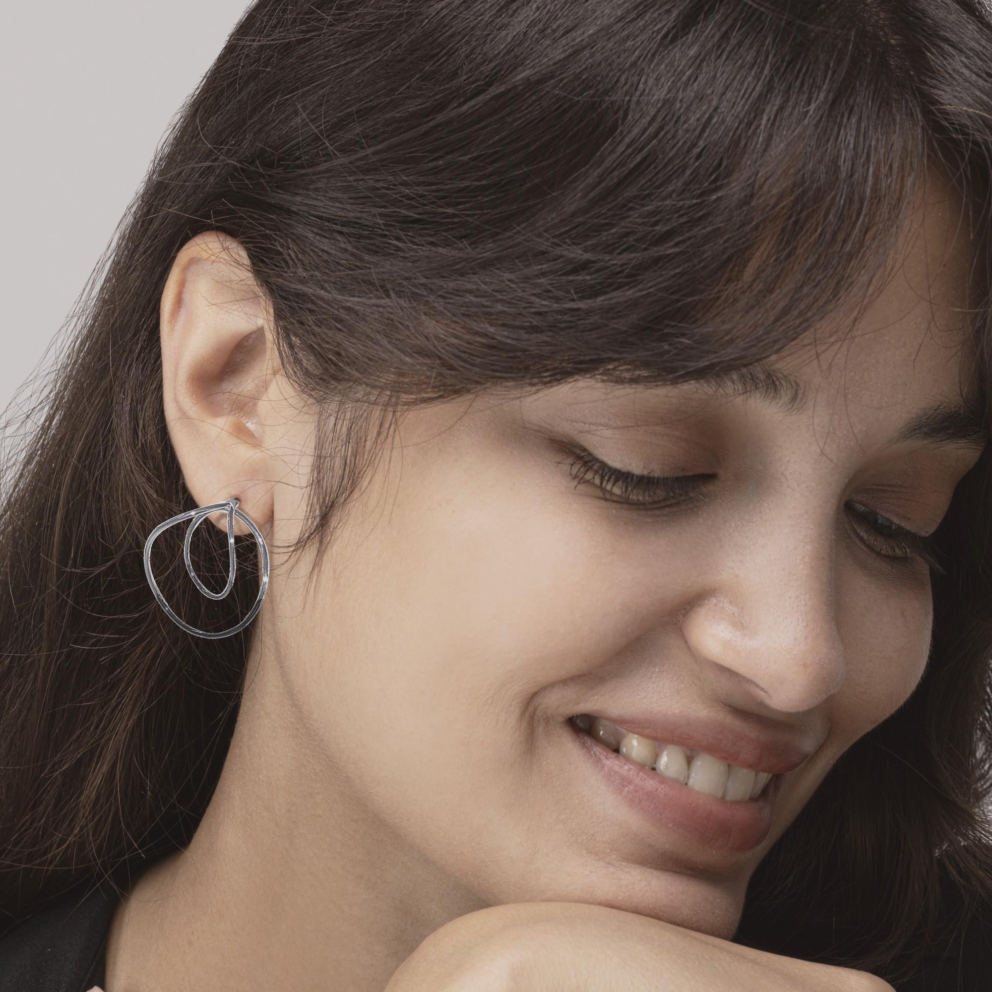 Alex Jona design collection, hand crafted in Italy, sterling silver large swirl earrings. 

Alex Jona jewels stand out, not only for their special design and for the excellent quality of the gemstones, but also for the careful attention given to