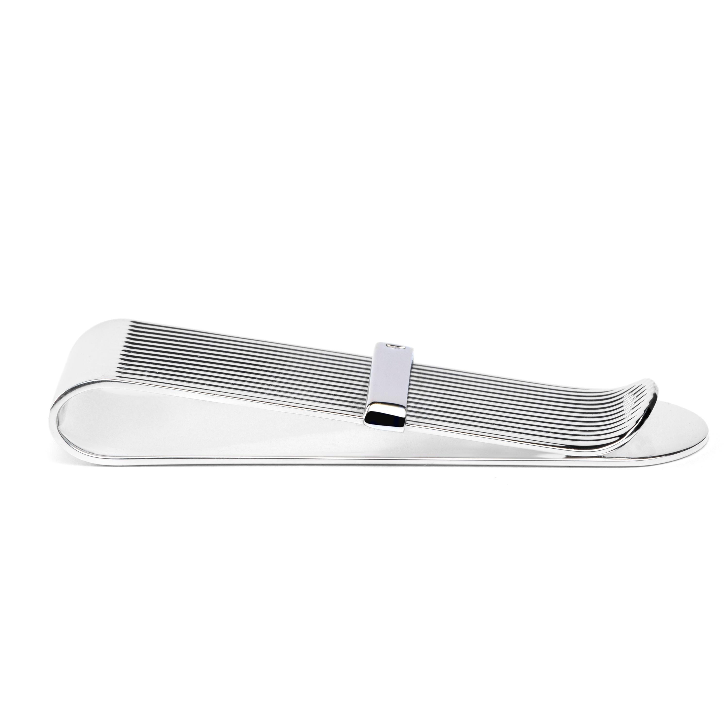 Alex Jona hand crafted in Italy, rhodium plated Sterling Silver money clip.
Dimensions: 2.22 in. L x 0.90 in. W x 0.32 in. D - 56 mm. L x 22 mm. W x 8 mm. D.
All Jona jewelry is new and has never been previously owned or worn. Each item will arrive