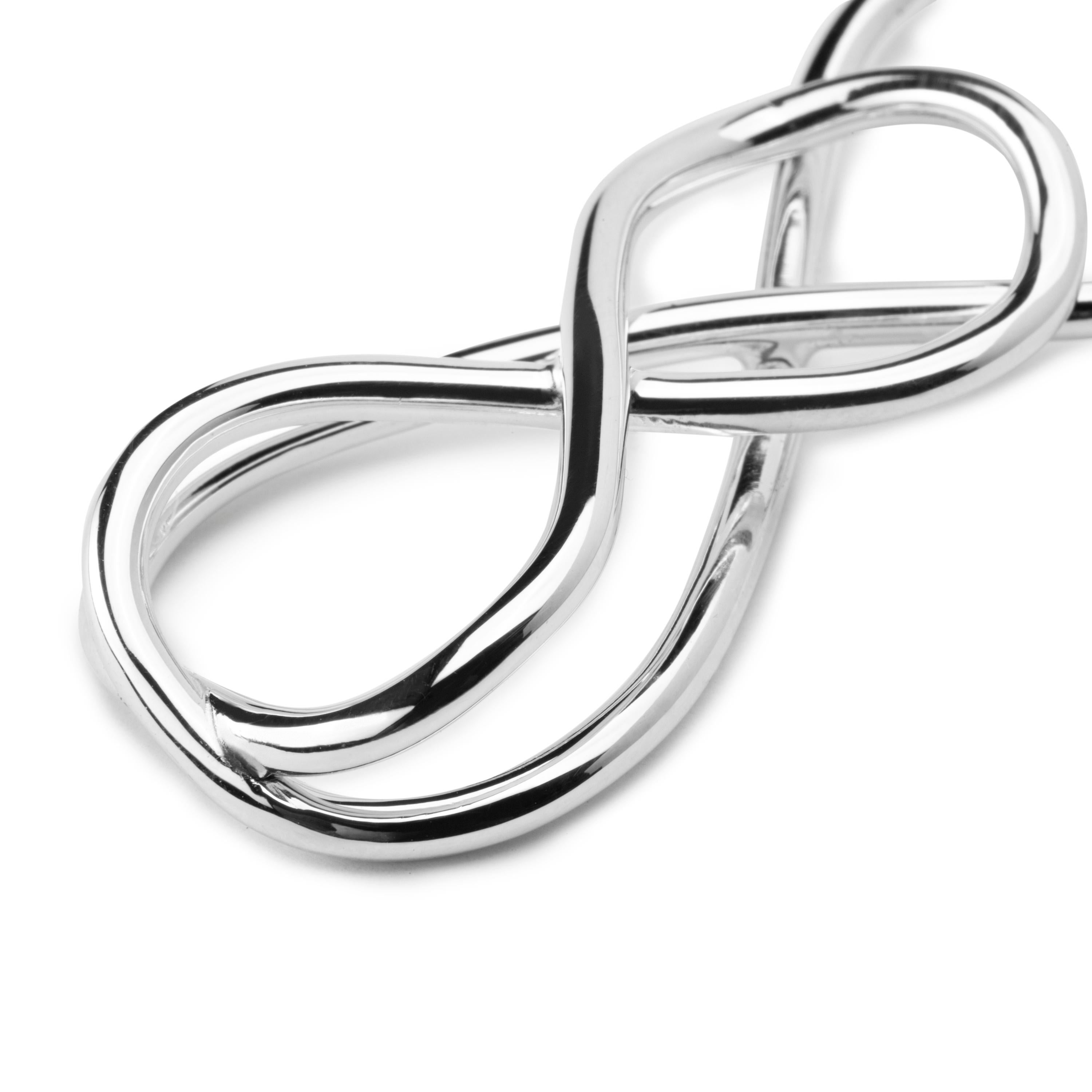 Alex Jona design collection, hand crafted in Italy, rhodium plated Sterling Silver money clip.
Dimensions: 2.32 in. L x 0.85 in. W x 0.36 in. D - 59 mm. L x 22 mm. W x 10 mm. D

Alex Jona gifts stand out, not only for their special design and for