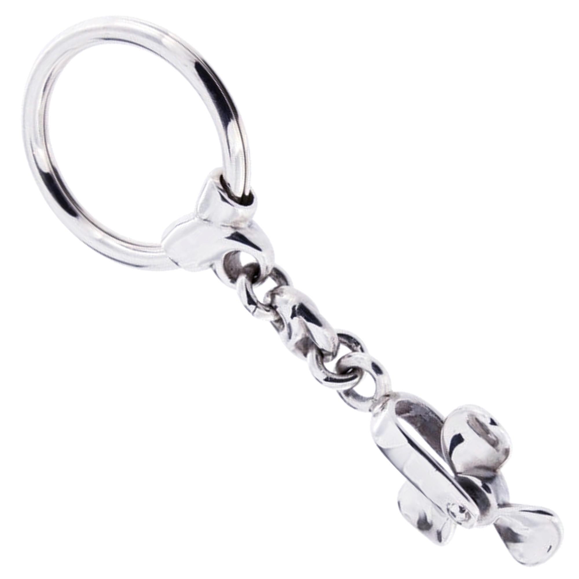Alex Jona design collection, hand crafted in Italy, rhodium plated Sterling Silver propeller key holder. Propeller dimensions : Diameter 0.84 in/ 21.41 mm x Depth: 0.33 in./ 8.39 mm

Alex Jona gifts stand out, not only for their special design and