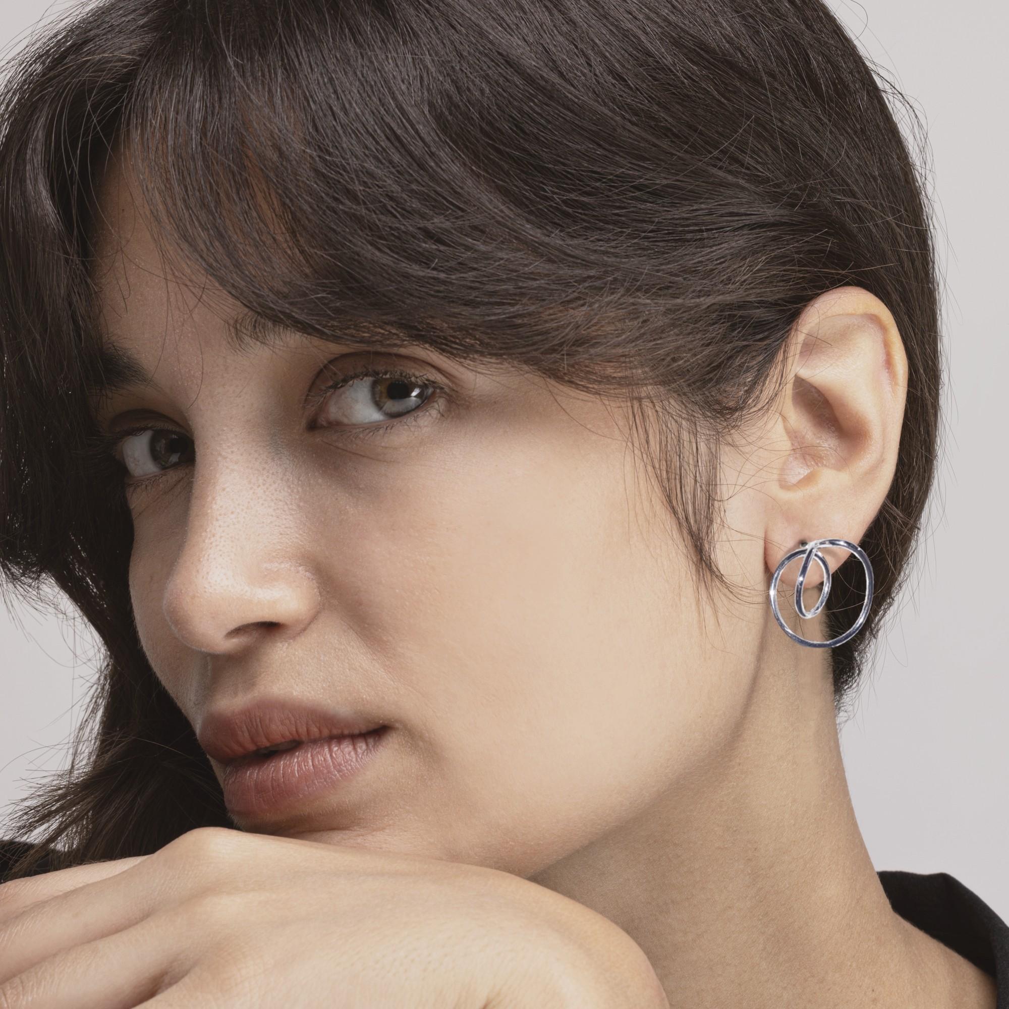 Alex Jona design collection, hand crafted in Italy, sterling silver swirl earrings. 

Alex Jona jewels stand out, not only for their special design and for the excellent quality of the gemstones, but also for the careful attention given to details