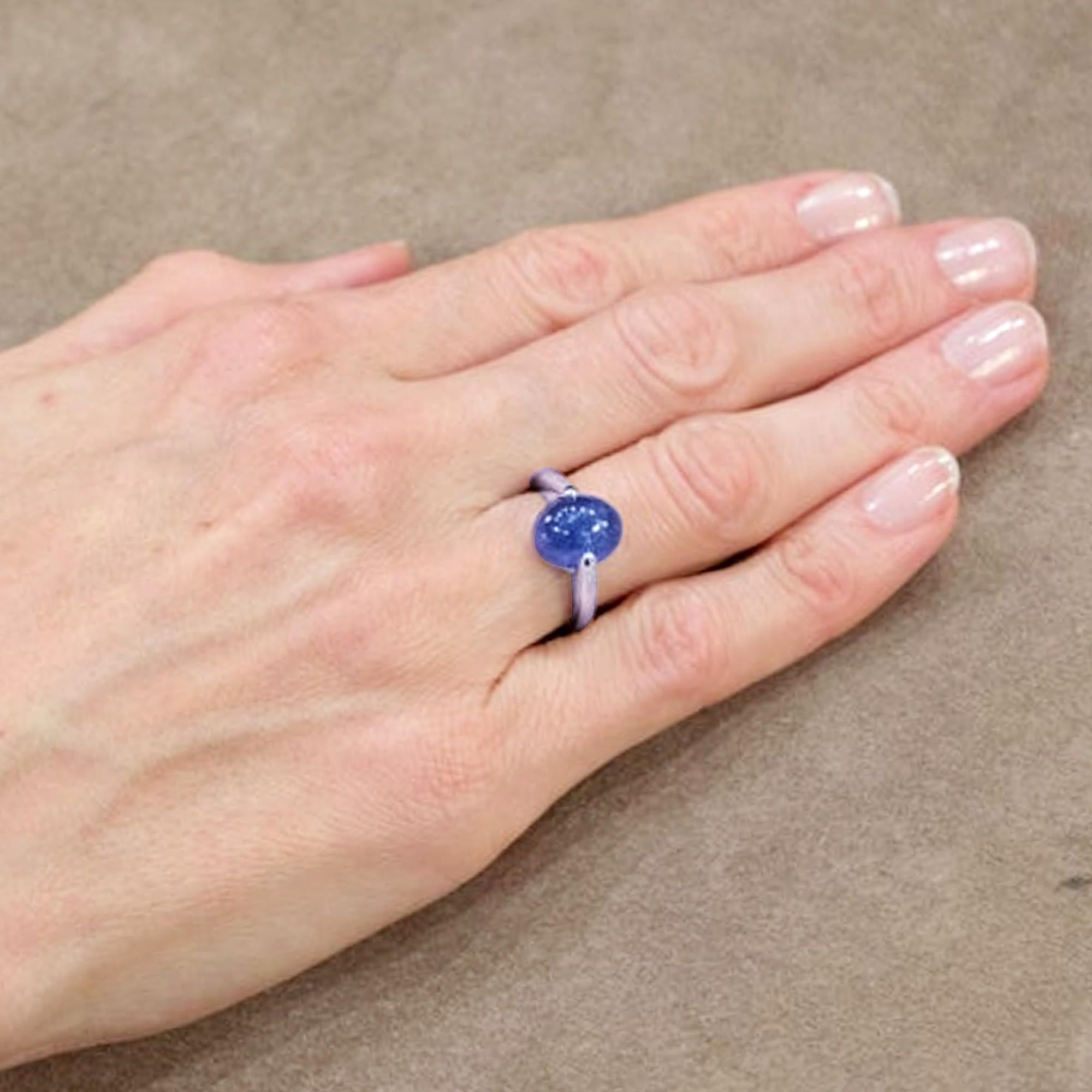 Alex Jona design collection, hand crafted in Italy, 18 karat white gold ring centering a cabochon cut intense blue Tanzanite weighing 5.4 carats. Ring US size 6/ EU size 12 (can be sized to any specification).
Dimensions: 0.96 in. H x 0.92 in. W x