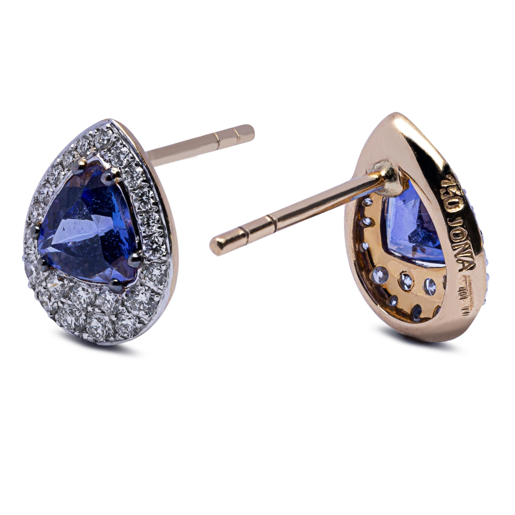 Alex Jona design collection, hand crafted in Italy, 18k yellow and white gold stud earrings centering two triangular cut Tanzanites weighing 1.35 carats surrounded by 44 white diamonds, F Color, VVS Clarity weighing 0.48 carats in total.
Dimensions: