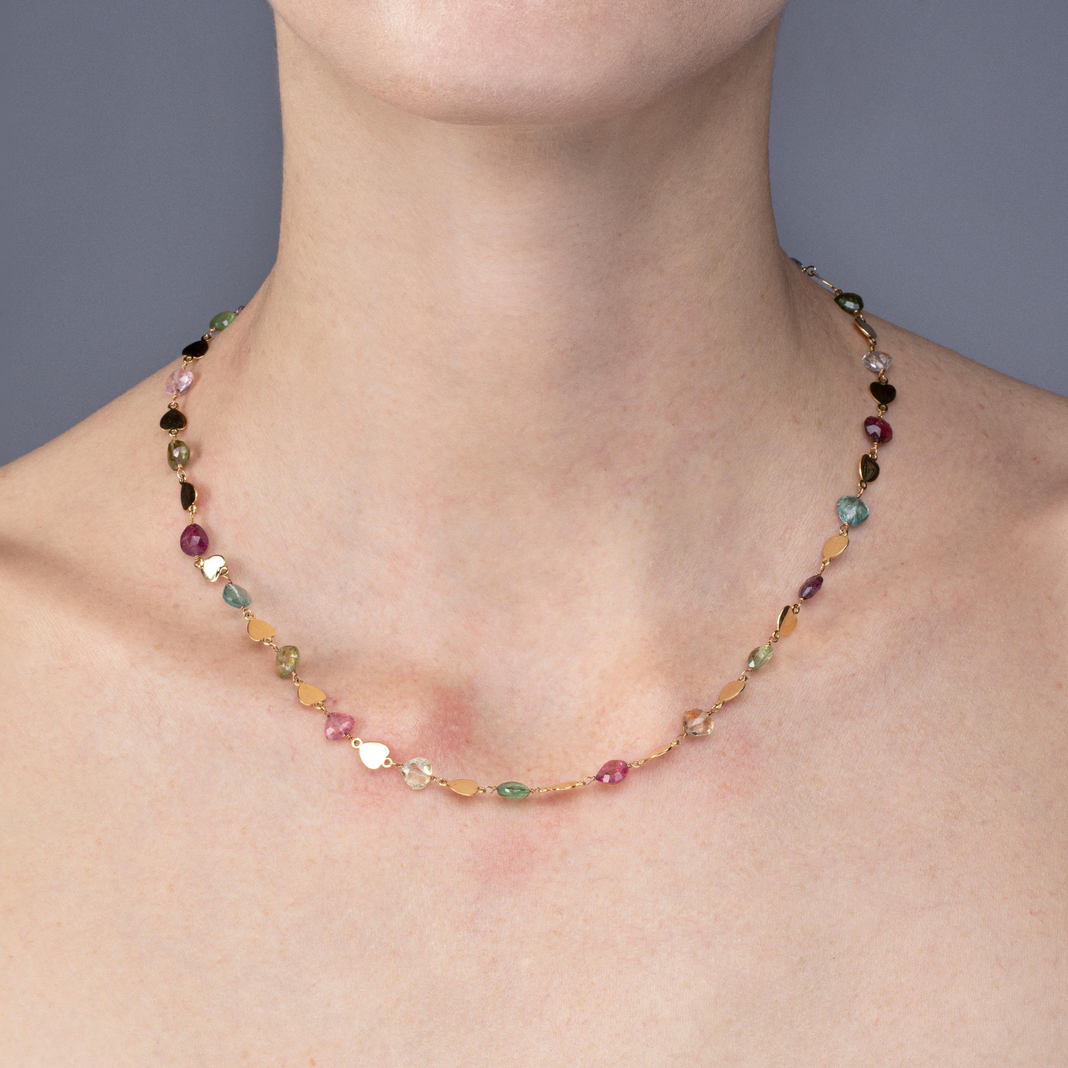 Alex Jona design collection, hand crafted in Italy, 18 karat yellow gold necklace, alternating heart shape multicolor faceted tourmalines with gold heart shaped links.
Alex Jona jewels stand out, not only for their special design and for the