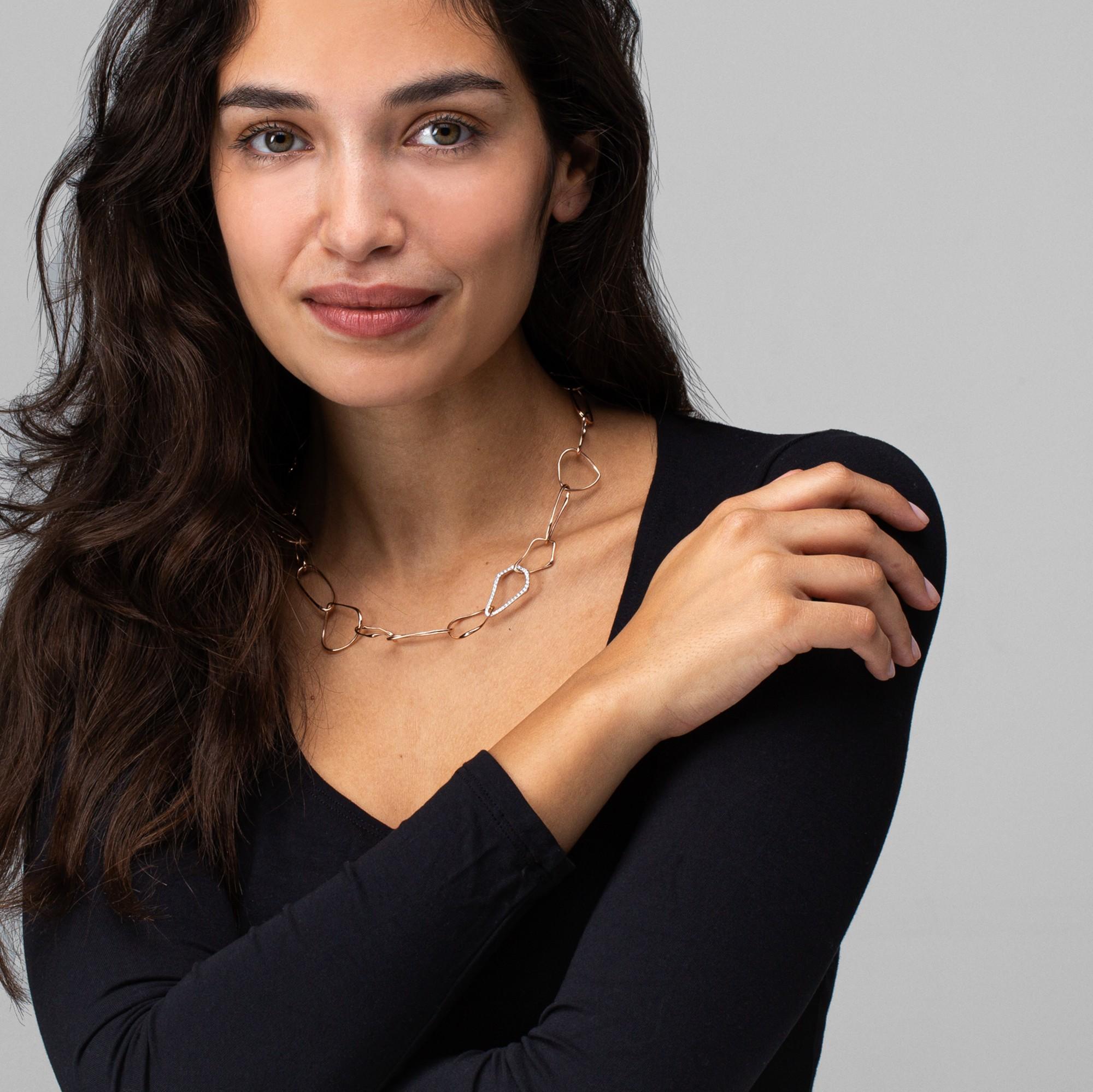 Alex Jona design collection, hand crafted in Italy, 18 karat rose gold irregular link necklace. One link is encrusted with white diamonds for a total weight of 0.67 carats.
Alex Jona jewels stand out, not only for their special design and for the