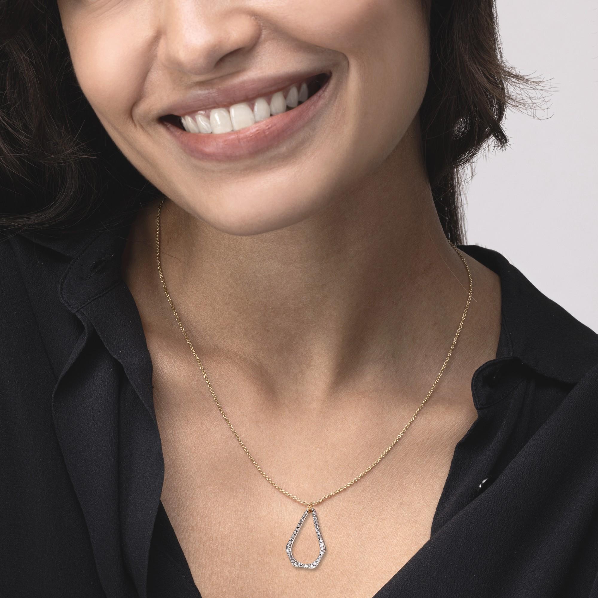 Alex Jona design collection, hand crafted in Italy, 18 karat rose gold irregular pendant necklace is encrusted with white diamonds for a total weight of 0.67 carats.

Alex Jona jewels stand out, not only for their special design and for the