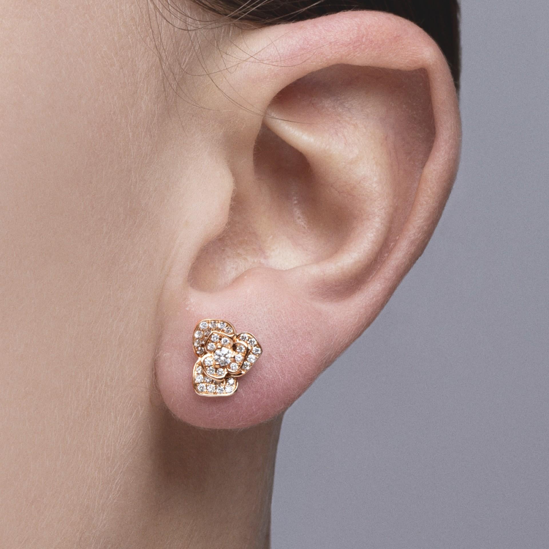 rose design gold earrings
