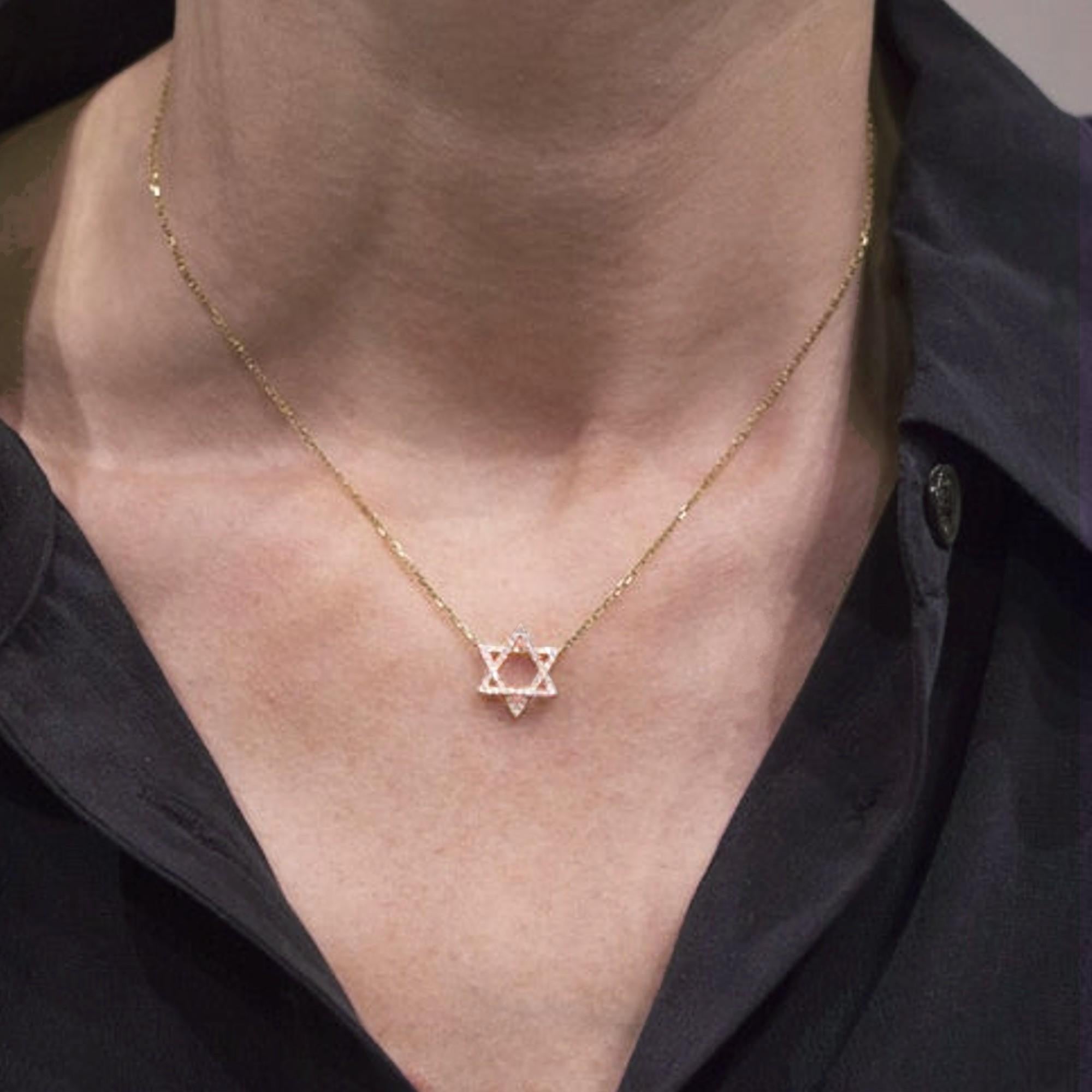 Alex Jona design collection, hand crafted in Italy, 18 karat yellow gold 0.18 carats white diamond Magen David pendant, mounted on a 18 karat yellow gold chain 16.5inch-45cm long.

Dimensions:
0.57 in Diameter / 0.12 in Depth
14.5 mm Diameter / 3.2