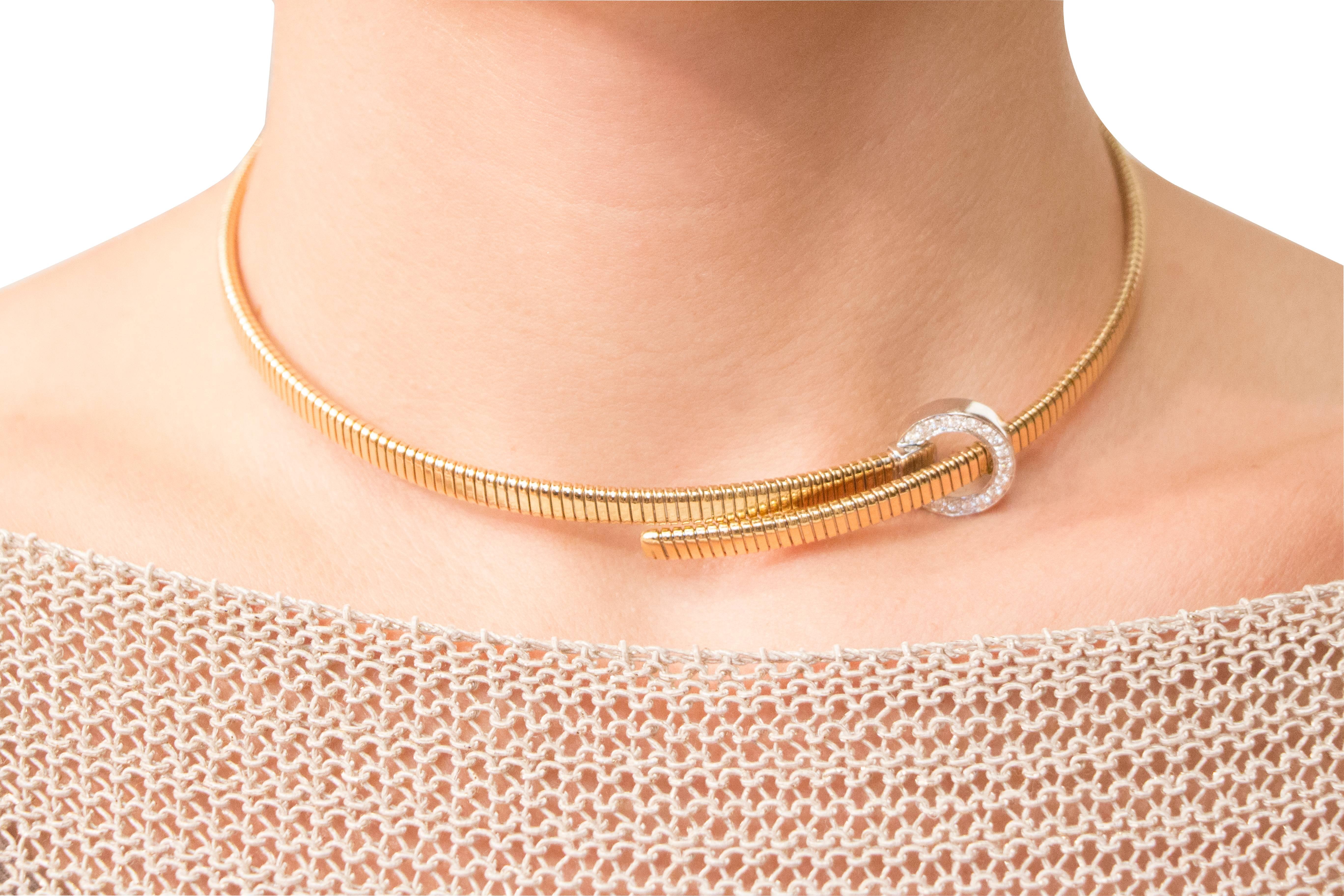 Alex Jona design collection, hand crafted in Italy, tubogas 18k yellow gold belt choker necklace with a circle white gold buckle set with white diamonds, F color, VVS1 clarity.
Dimensions: H x 0.5 cm, Dm x 13 cm - H x 0.19 in., Dm x 5.11 in.

Alex