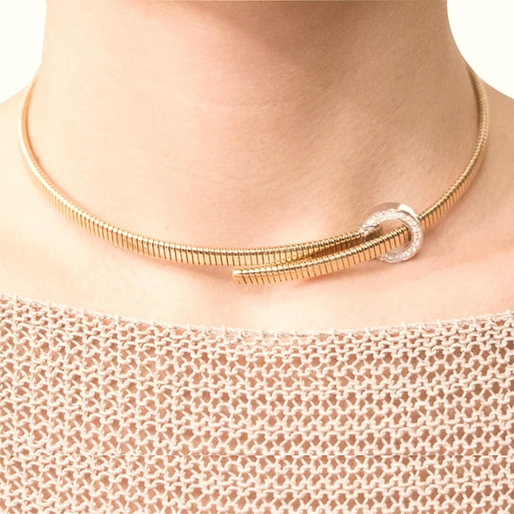 Alex Jona design collection, hand crafted in Italy, tubogas 18k yellow gold belt choker necklace with a circle white gold buckle set with white diamonds, F color, VVS1 clarity.
Dimensions: H x 0.5 cm, Dm x 13 cm - H x 0.19 in., Dm x 5.11 in.

Alex