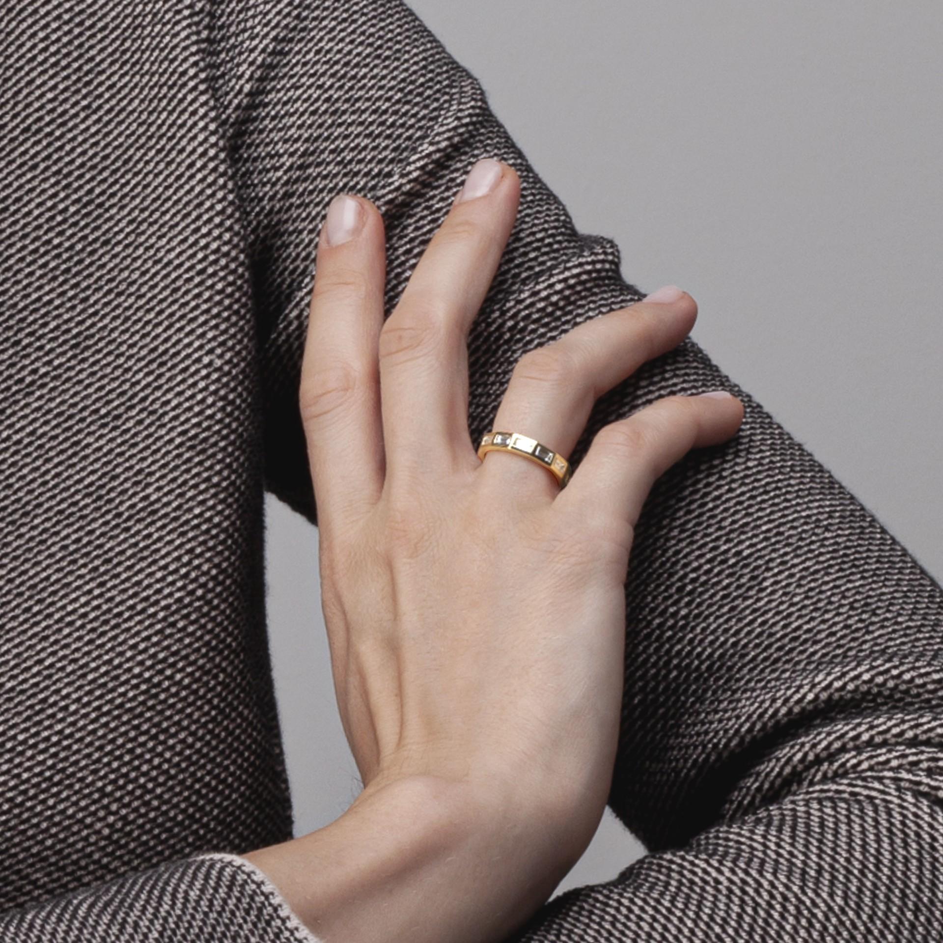 Alex Jona design collection, hand crafted in Italy, 18 karat yellow gold eternity band ring, showcasing 13 baguette cut white diamonds bezel-set weighing 1.80 total carats, E color, VVS1 clarity. Size 6.5, can be made to order in any size.