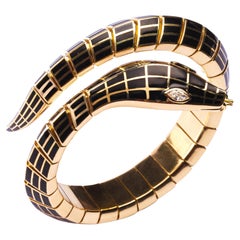 Alex Jona Bracciale flessibile a serpente in oro con diamanti bianchi e smalto nero