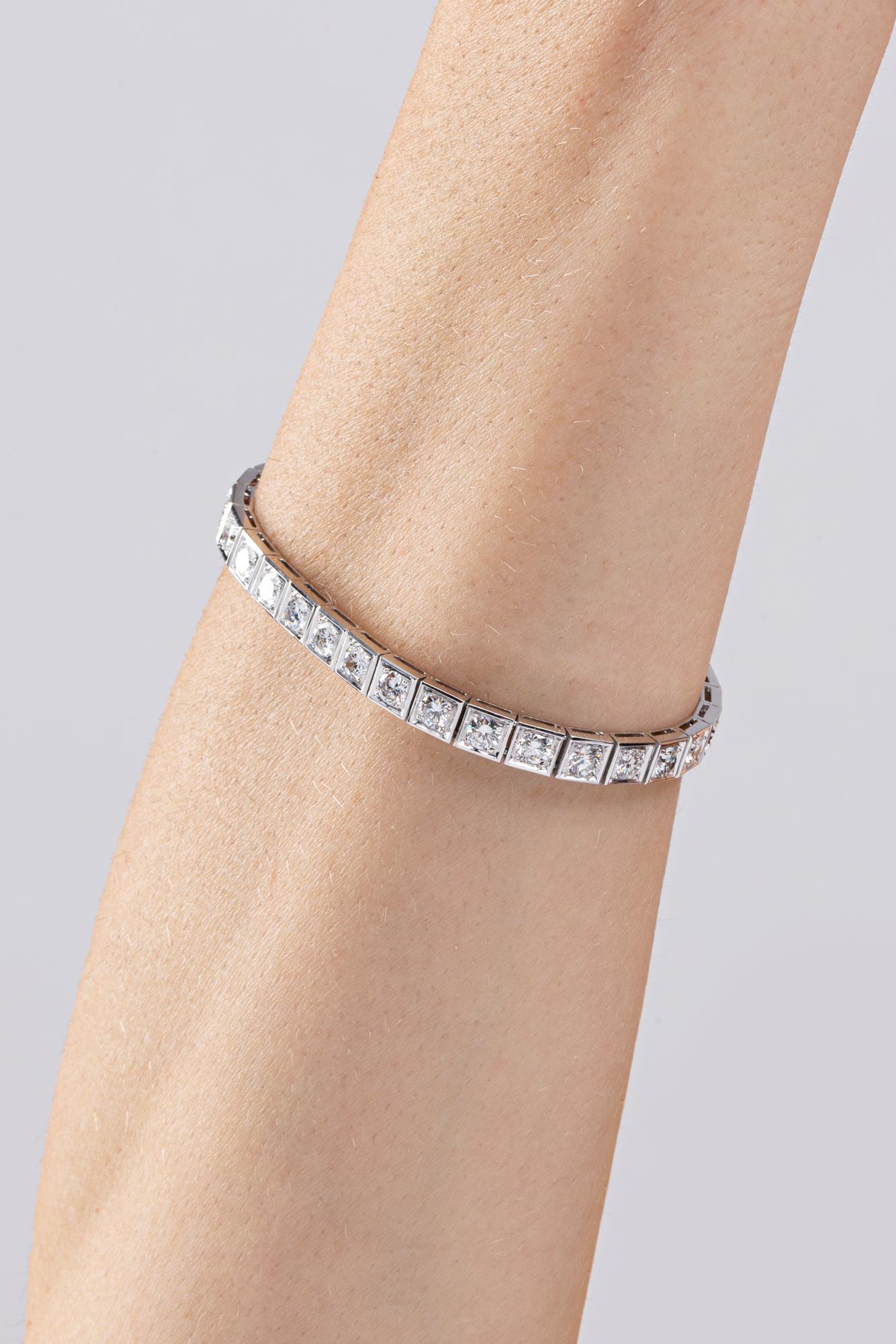Alex Jona design collection, hand crafted in Italy, platinum tennis bracelet 7 in. long, set with 31  white diamonds, F color, VVS1 clarity, weighing 0.18 carats each, for a total weight of 5.60. 

Alex Jona jewels stand out, not only for their