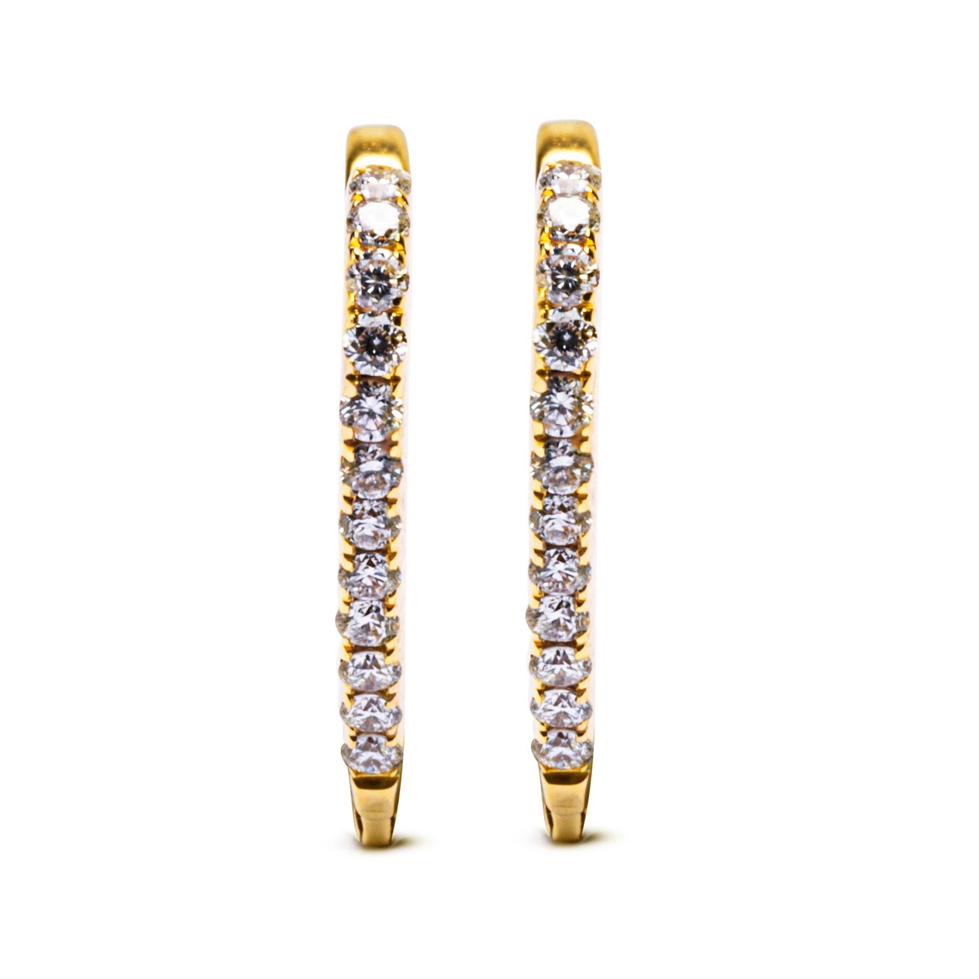 Alex Jona design collection, hand crafted in Italy, 18 karat yellow gold heart earrings set with 0.22 carats of white diamonds, F Color, VVS1 Clarity. 
Dimensions: W 0.05in/1.5mm, H 0.55in/14mm, D 0.66in/16.77mm.

Alex Jona jewels stand out, not