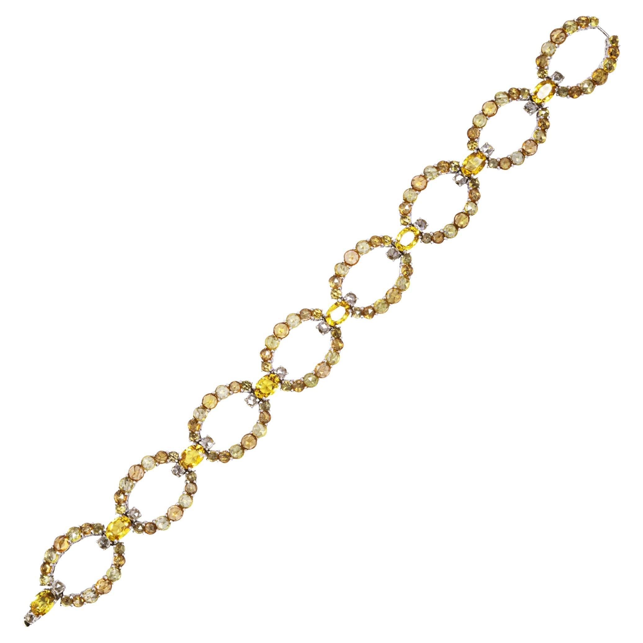 Alex Jona Bracciale in oro bianco 18 carati con zaffiro giallo e arancione e diamante bianco