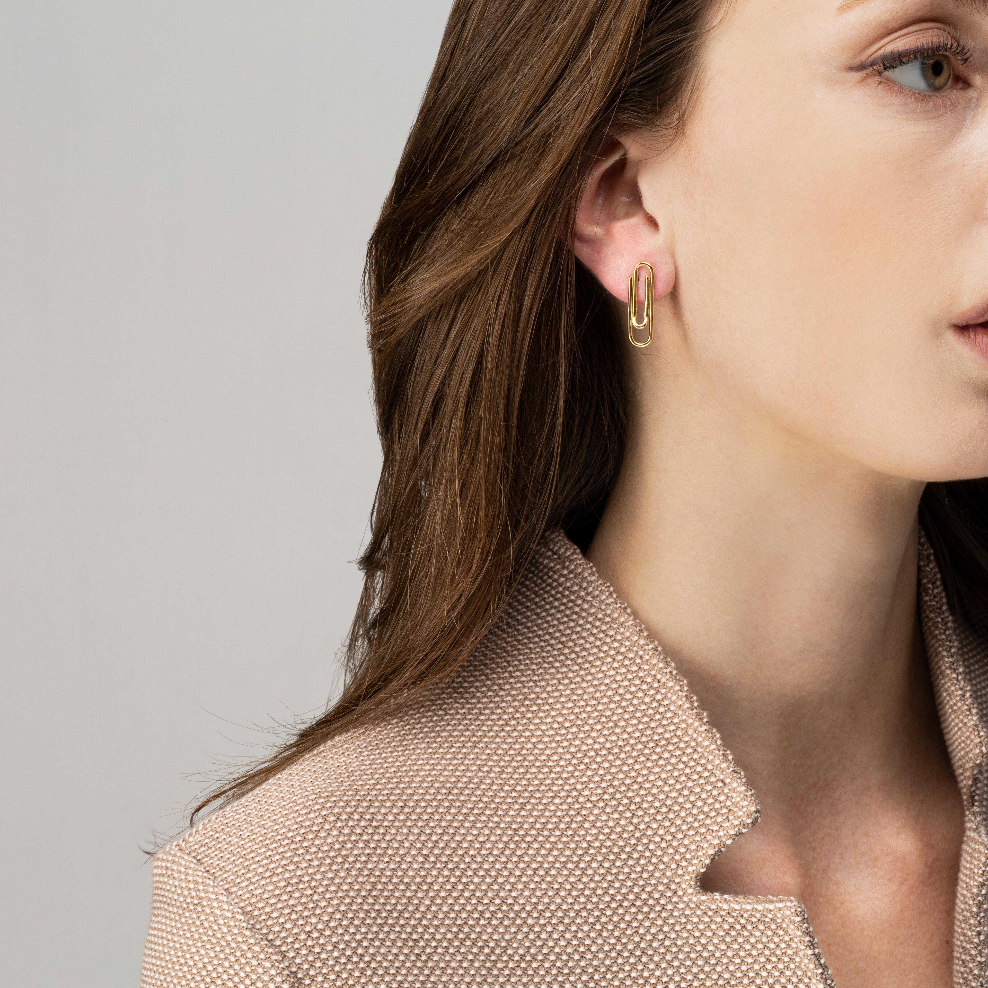 Alex Jona design collection, hand crafted in Italy, 18 karat yellow gold paper clip stud earrings
Dimensions:  H  1.01in/25.73mm, W 0.34in/8,6mm, D 0.09in/2.49mm.

Alex Jona jewels stand out, not only for their special design and for the excellent