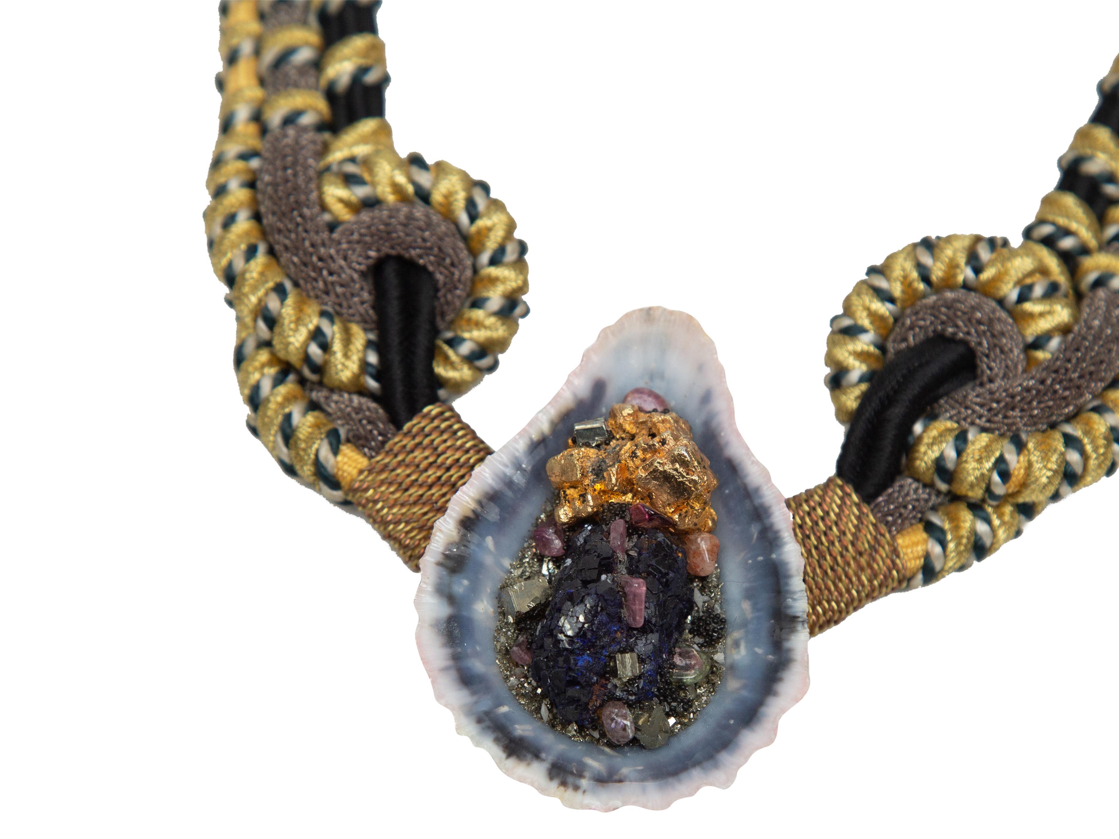 Product details:  Multicolor macrame necklace by Alex & Lee.  Accented with an embellished seashell.  Hook closure.  18