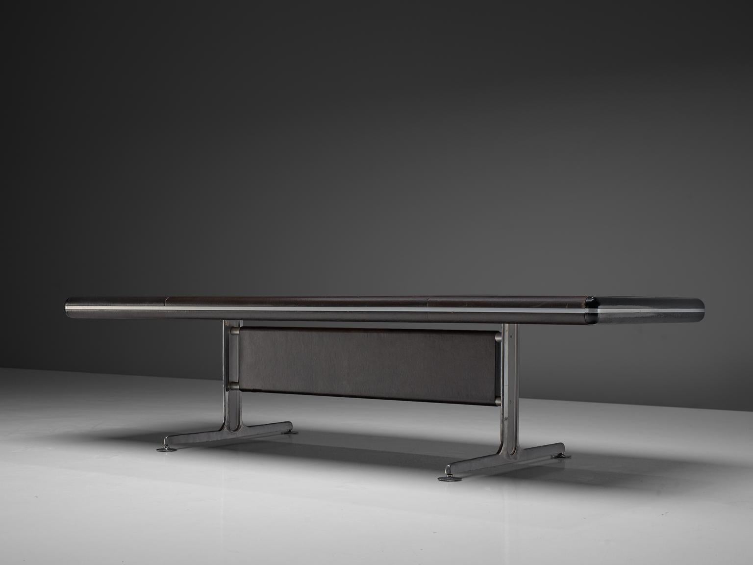 Alex Linder, large dining table, black leather and aluminum, Denmark, 1970s.

This large table is designed by the Danish designer Alex Linder. He is not as well known as other designers of this period, but made some real exceptional designs. This