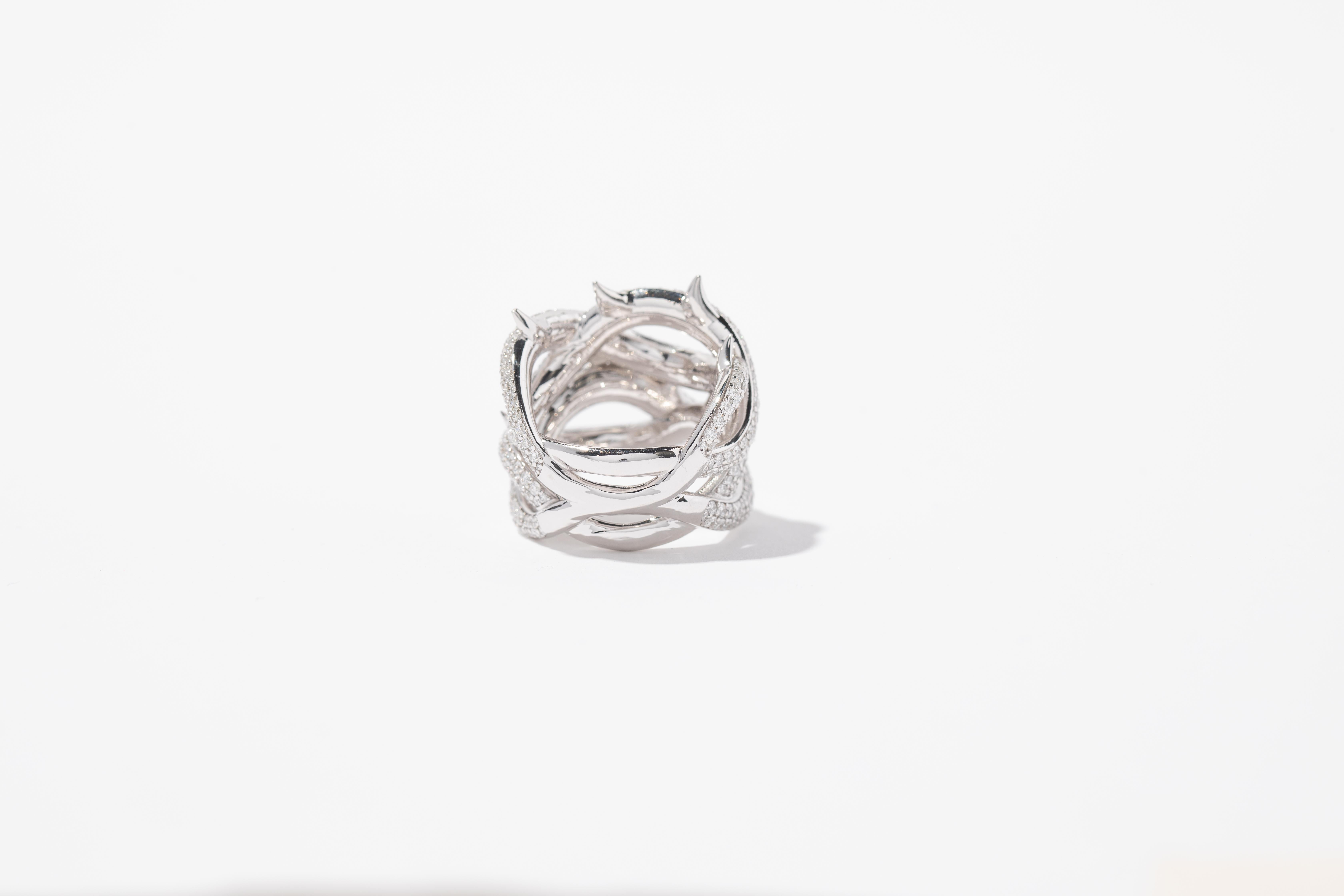 Alex Moss New York designs jewellery for The Biebers, Cher, Madonna, Drake, Tyler, the Creator and Jack Harlow, among others. This aptly named ring is cast from 14-karat white gold in the shape of intertwined vines encrusted with pavé diamonds. The