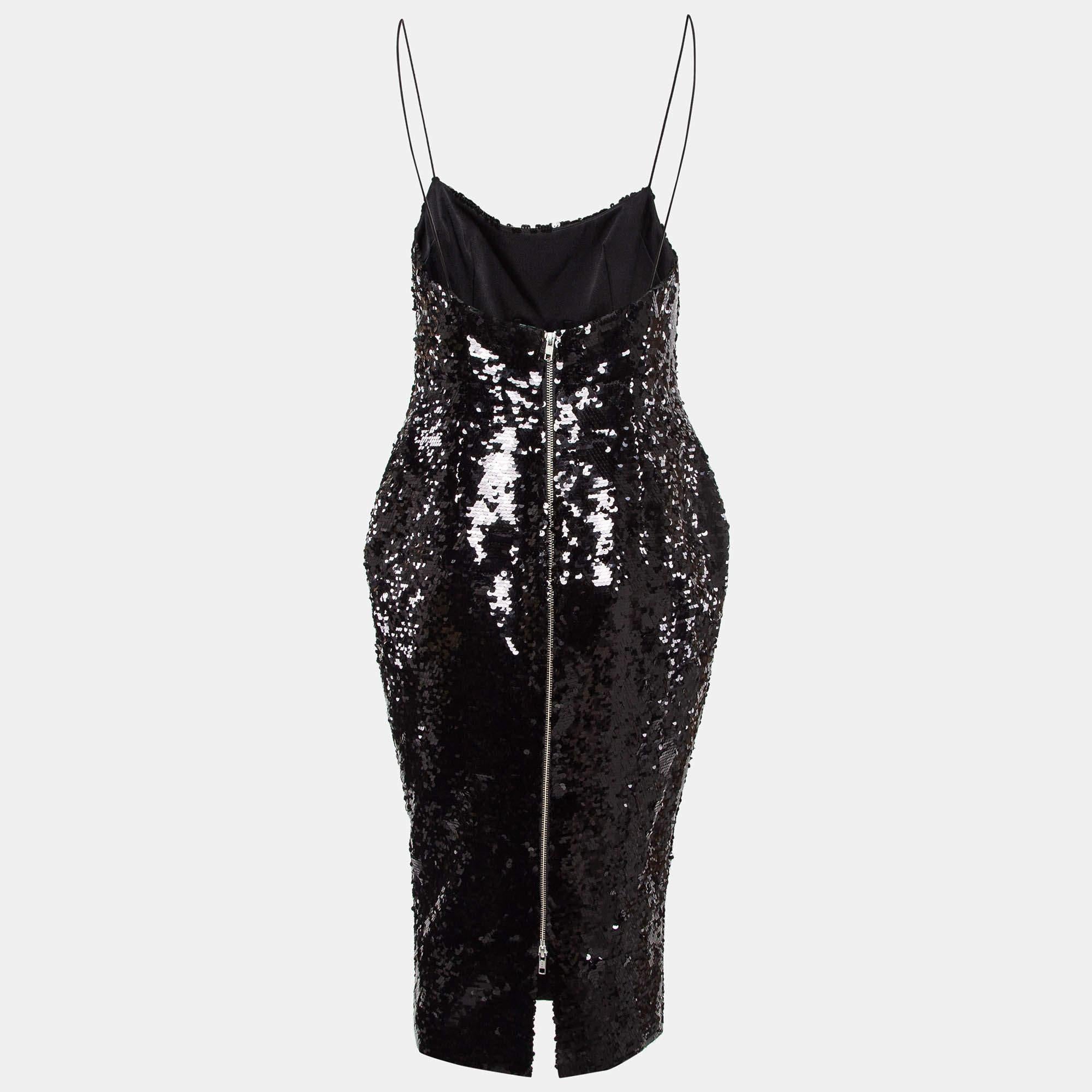 Irradia sicurezza con questo abito nero senza maniche di Alex Perry. Il design elegante modella la tua silhouette.  mentre le paillettes scintillanti aggiungono un tocco di lucentezza. Grazie alla sua vestibilità aderente alla figura e all'eleganza