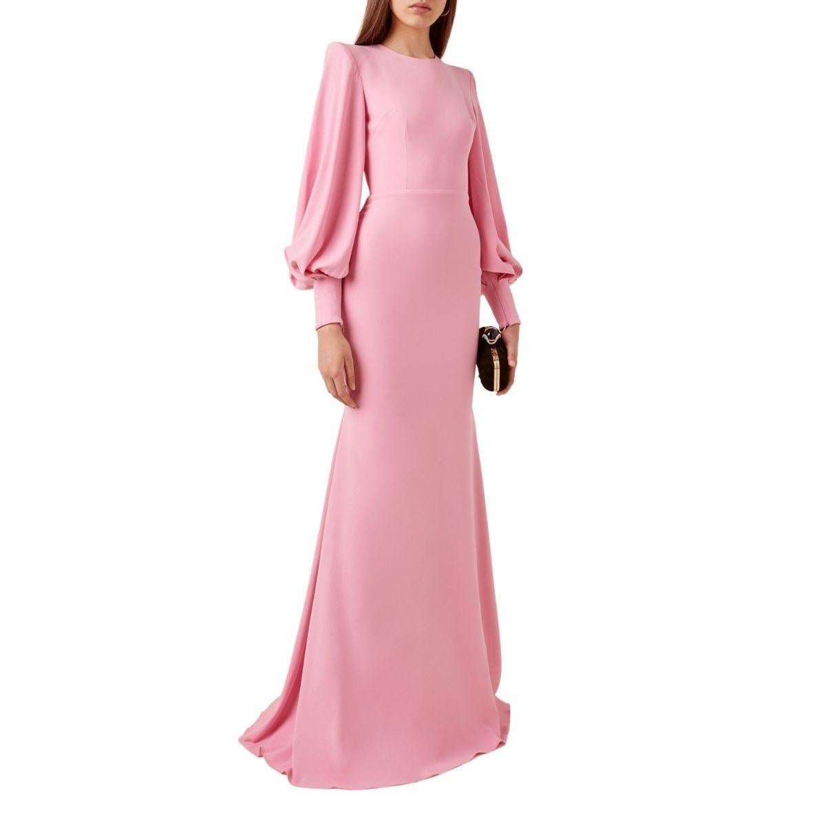 The 'David' gown has an extra sleeve and an elongated hem. This style is fitted through the hips in a trumpet silhouette and complete with voluminous bishop sleeves.
Zip fastening at back
Composition: 82% triacetate, 18% polyester
Dry