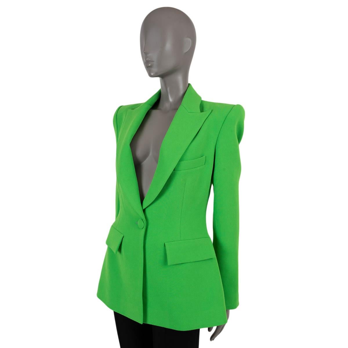 100% authentic Alex Perry Carter blazer in grass green stretch crêpe polyester (63%) and acetate (37%). Features peak lapels, sharp shoulder, a welt pocket and two flap pockets at the waist. Closes with a fabric cover button on the front and is