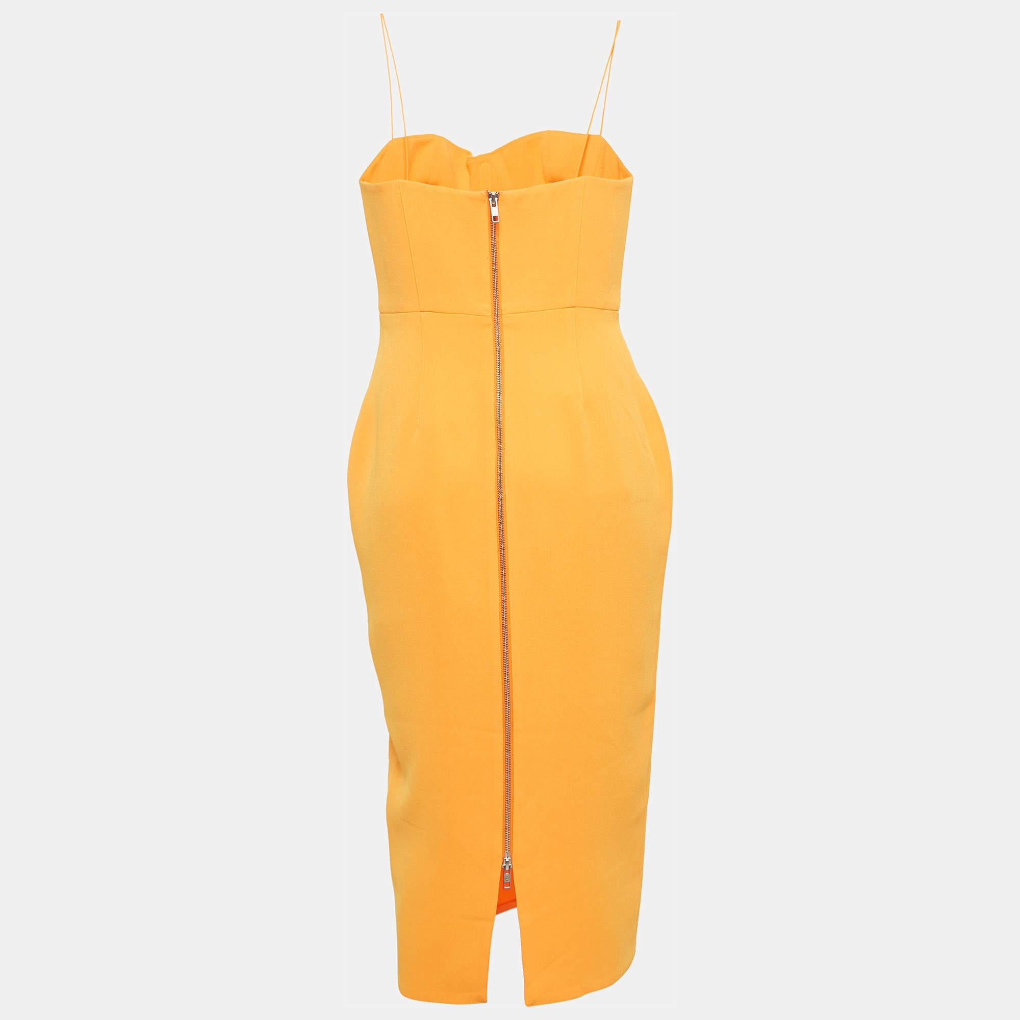 Cette élégante robe midi respire l'élégance et la sophistication. Sa longueur flatteuse se situe entre le genou et la cheville.  offrant une option polyvalente pour diverses occasions. Avec son design chic  il allie les tendances modernes au charme