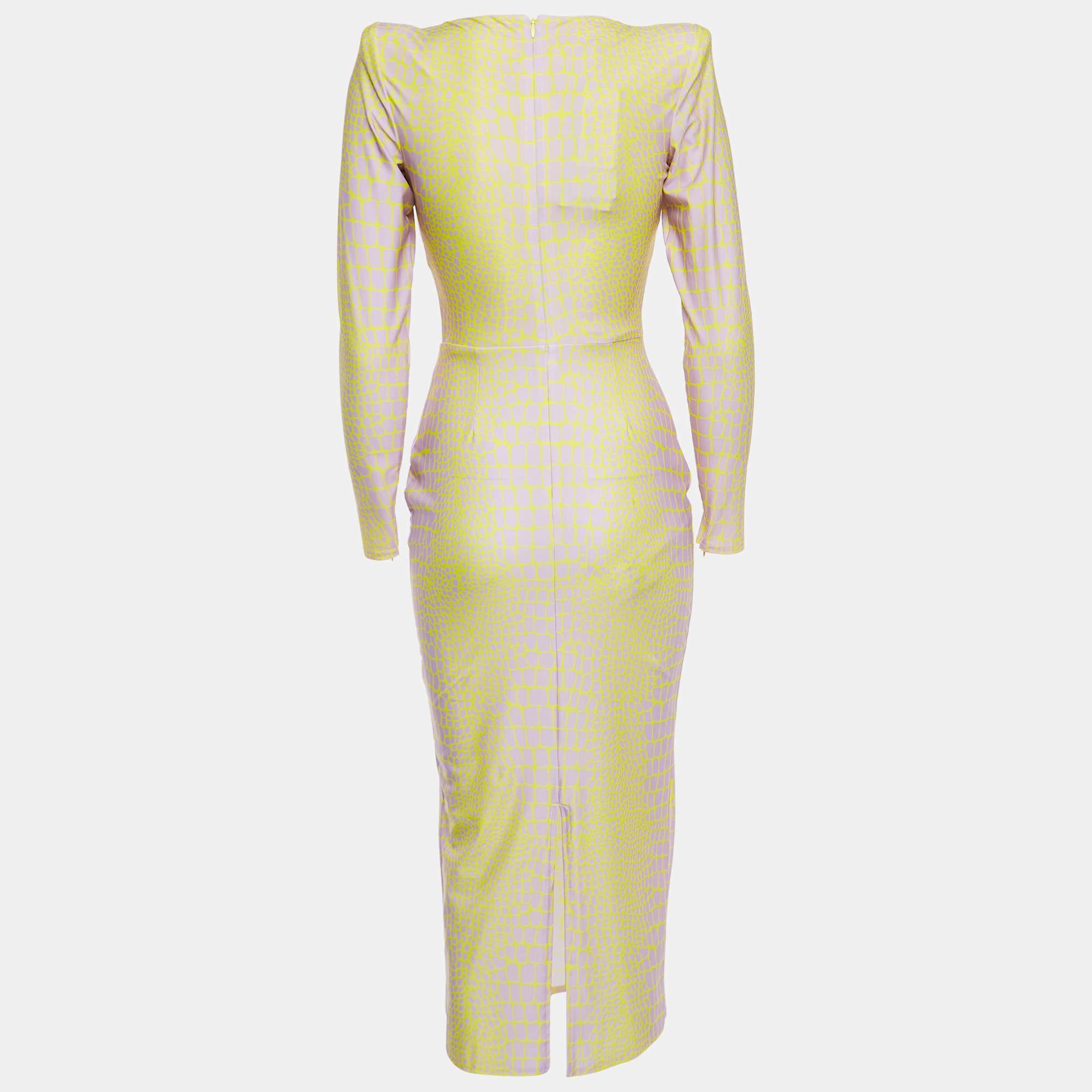 The Alex Perry dress is a striking and contemporary piece. Its vibrant yellow and lilac hues, coupled with a crocodile-inspired print, create a bold aesthetic. The jersey fabric offers comfort, while the midi length adds a touch of sophistication to