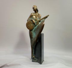 Girl playing the quitar. Realism, solid bronze sculpture