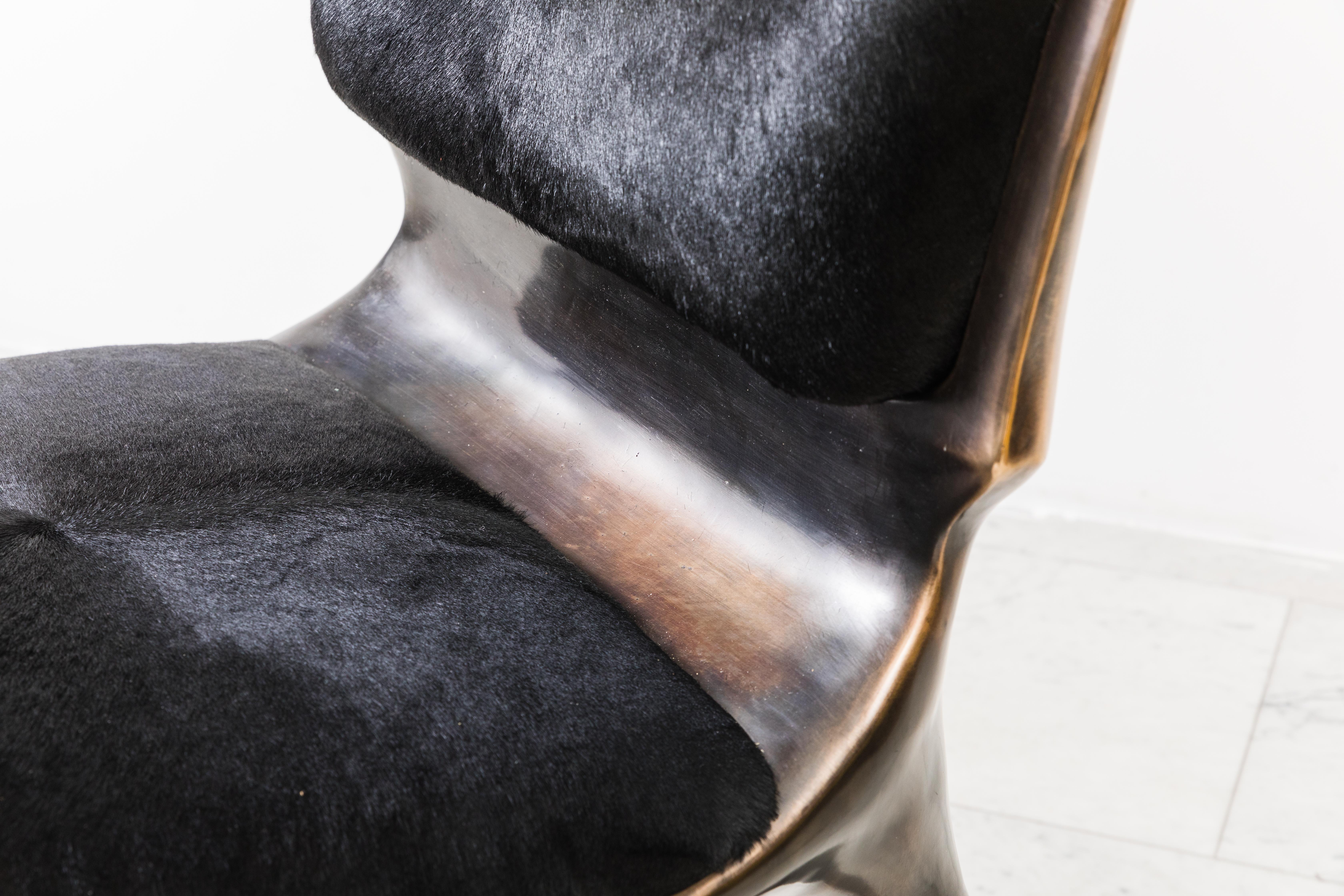 Inspired by his Biche Desk, the Tusk Chair reflects Alex Roskin penchant for an animality in form. The versatile chair can be used as a salon chair, a desk chair, or grouped for a dining set.

The chair features an mammalian physicality,